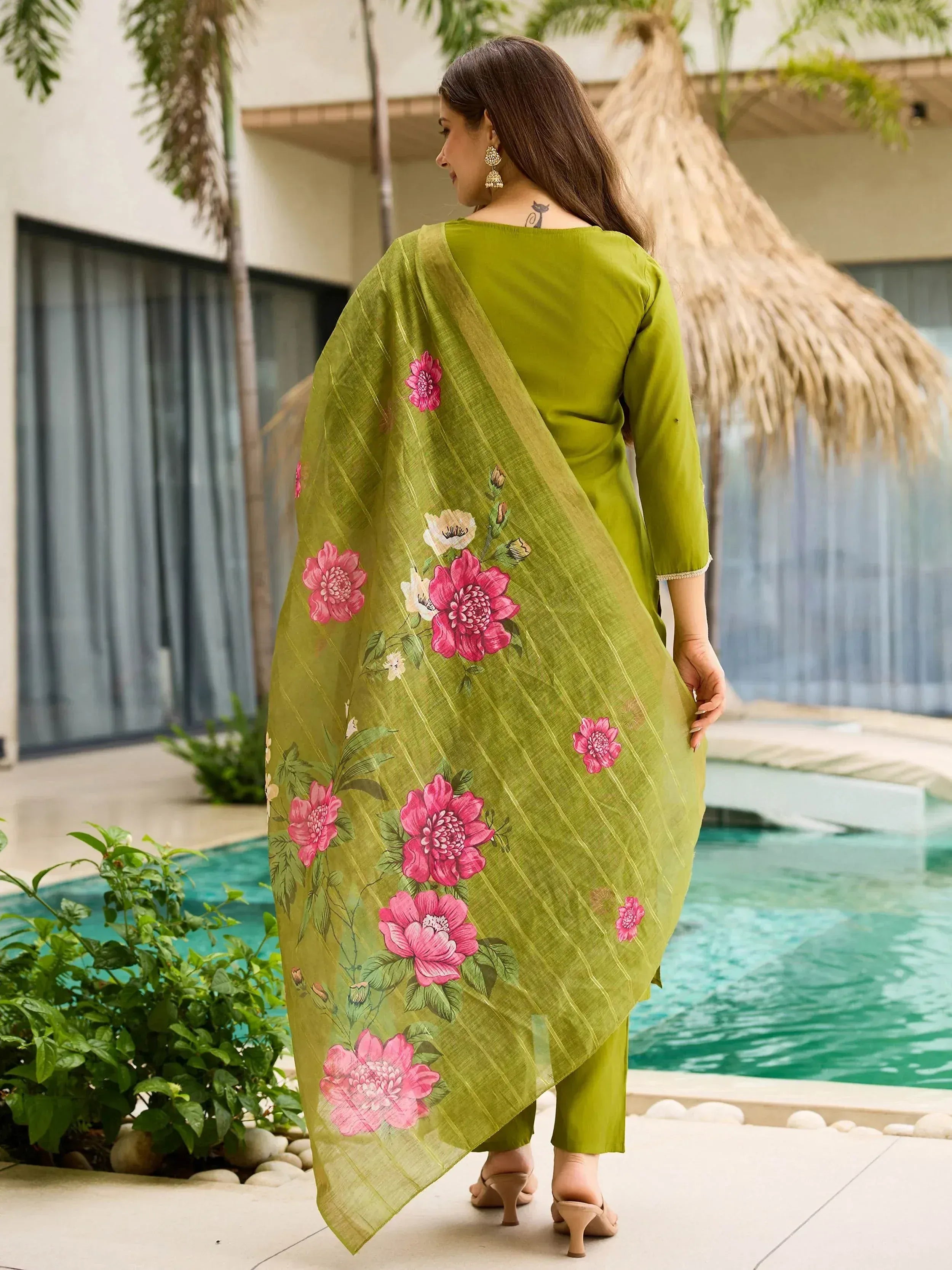 Green floral printed salwar kameez with dupatta, perfect for ethnic wear occasions near poolside