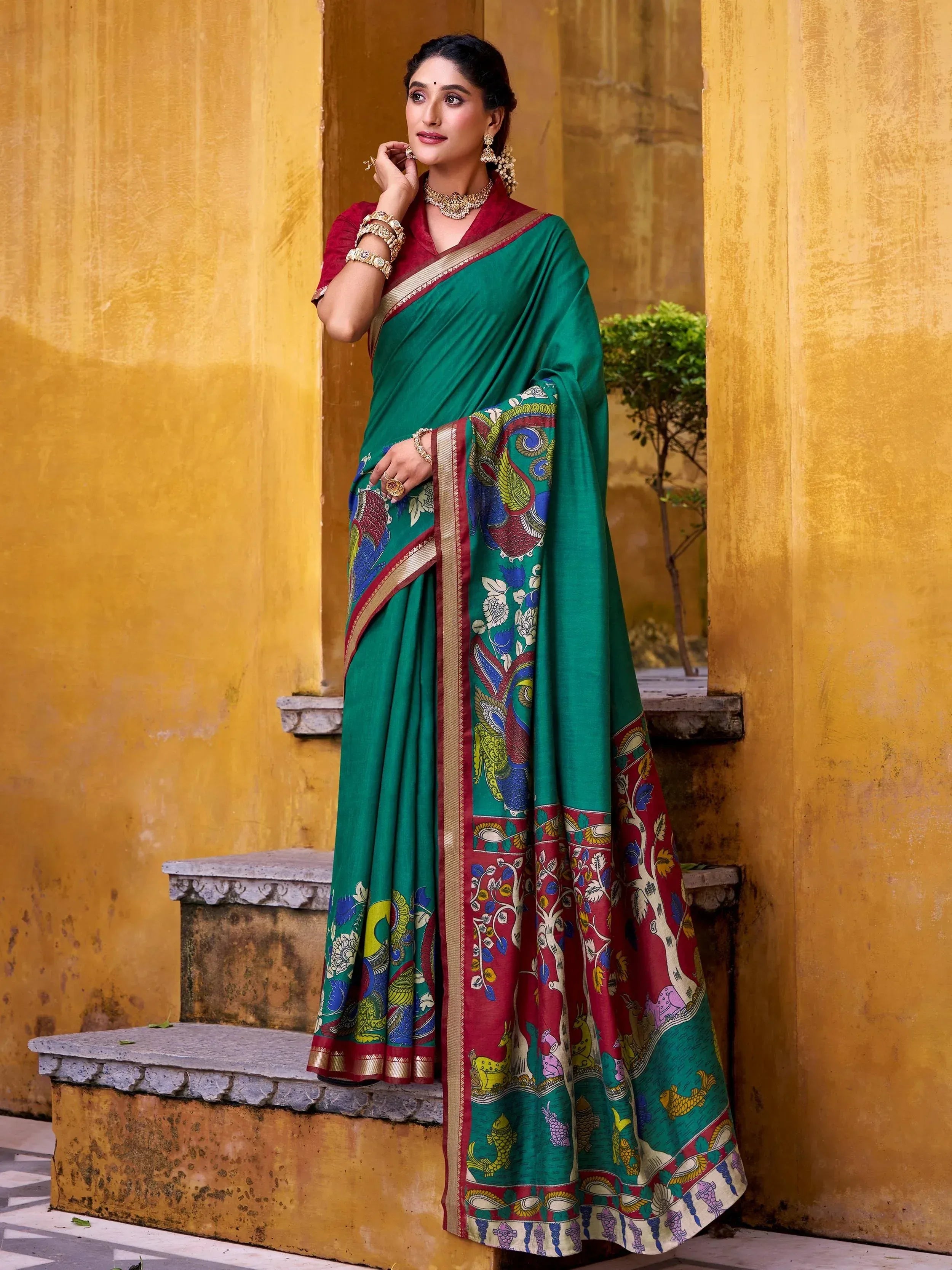 Green and red printed saree with peacock design, ethnic wear for women
