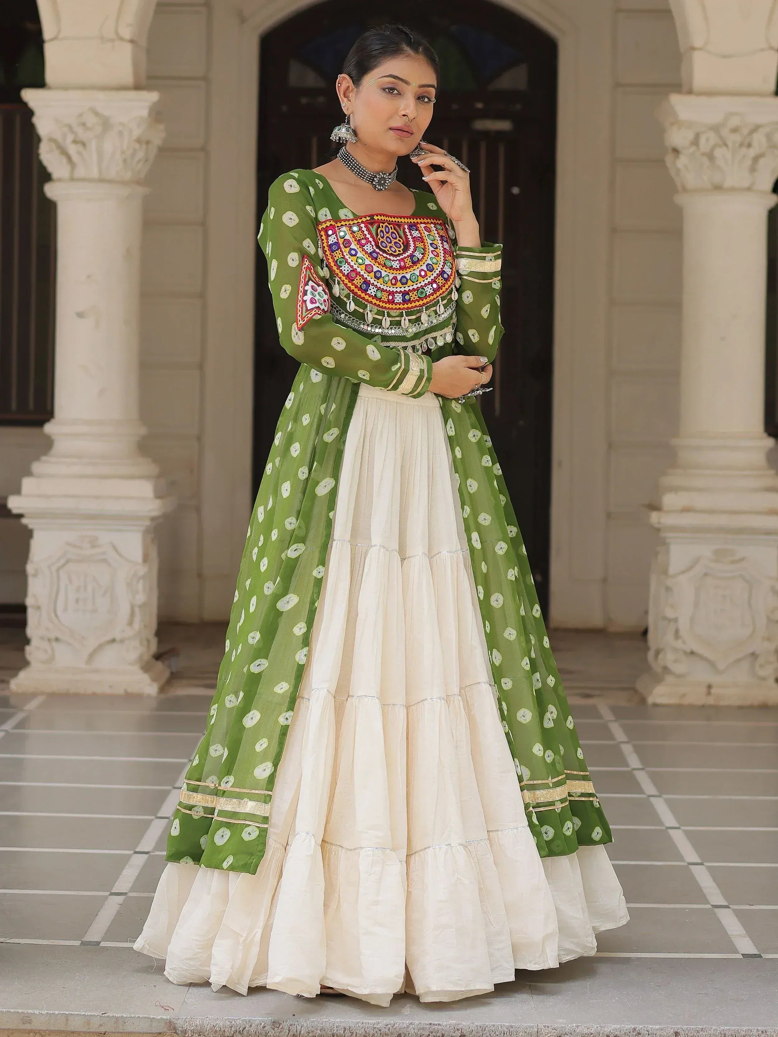 Green and cream ethnic anarkali with mirror work, perfect for Indian festivals and weddings