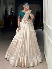 Spectacular Cream Silk Border Work Onam Wear Half Saree Lehenga