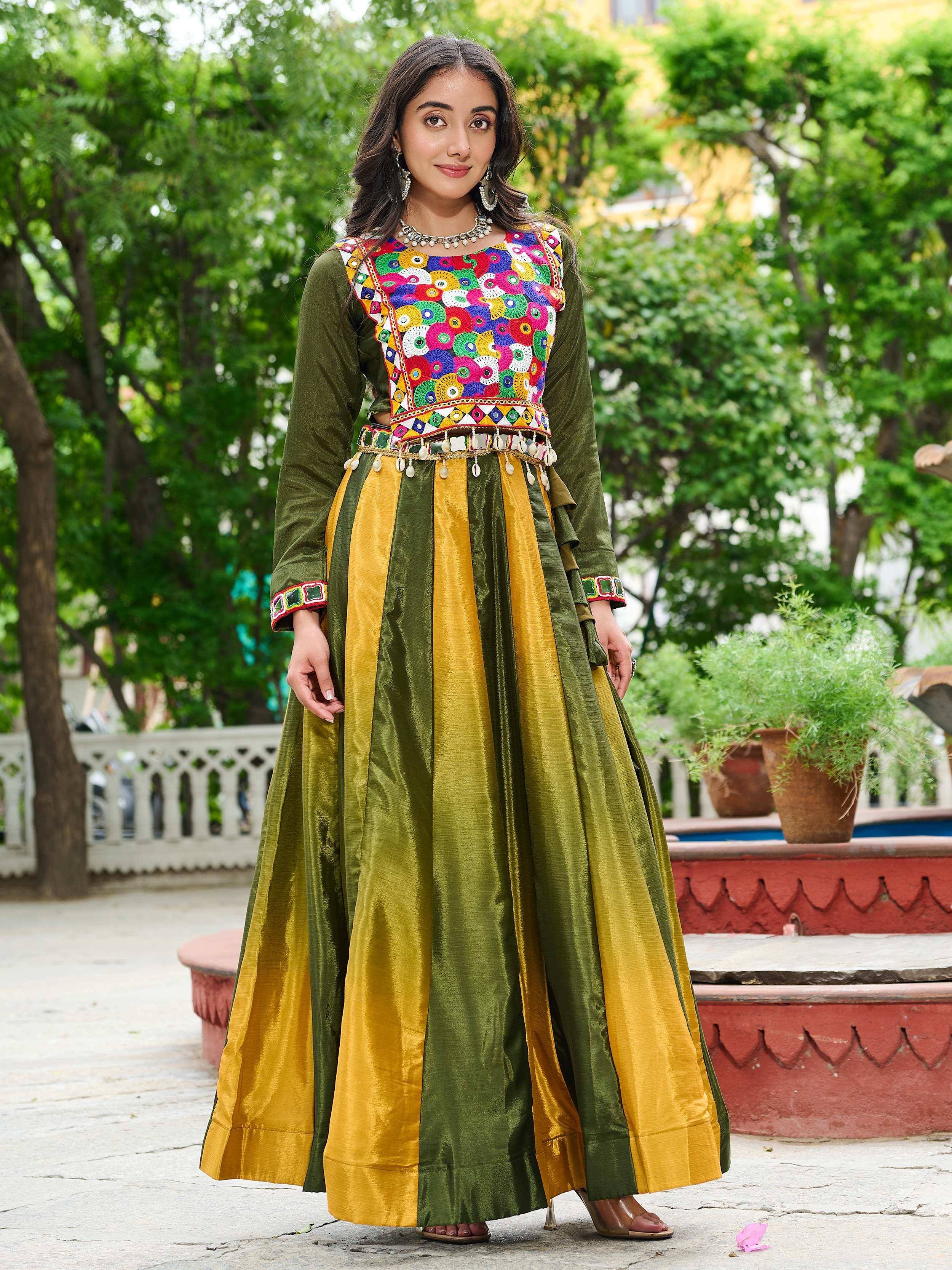 Colorful embroidered Indian ethnic gown with green and yellow panels, perfect for festive occasions.