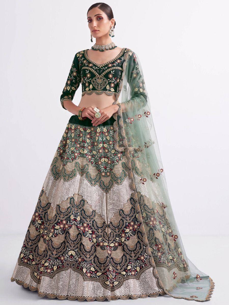 Designer green and gold embroidered lehenga choli with floral motifs and sheer dupatta for Indian ethnic wear
