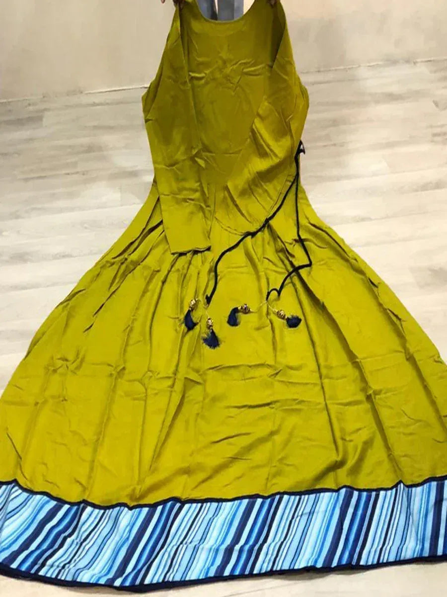 Olive green ethnic gown with blue striped hem and tassel details, perfect for Indian occasions.