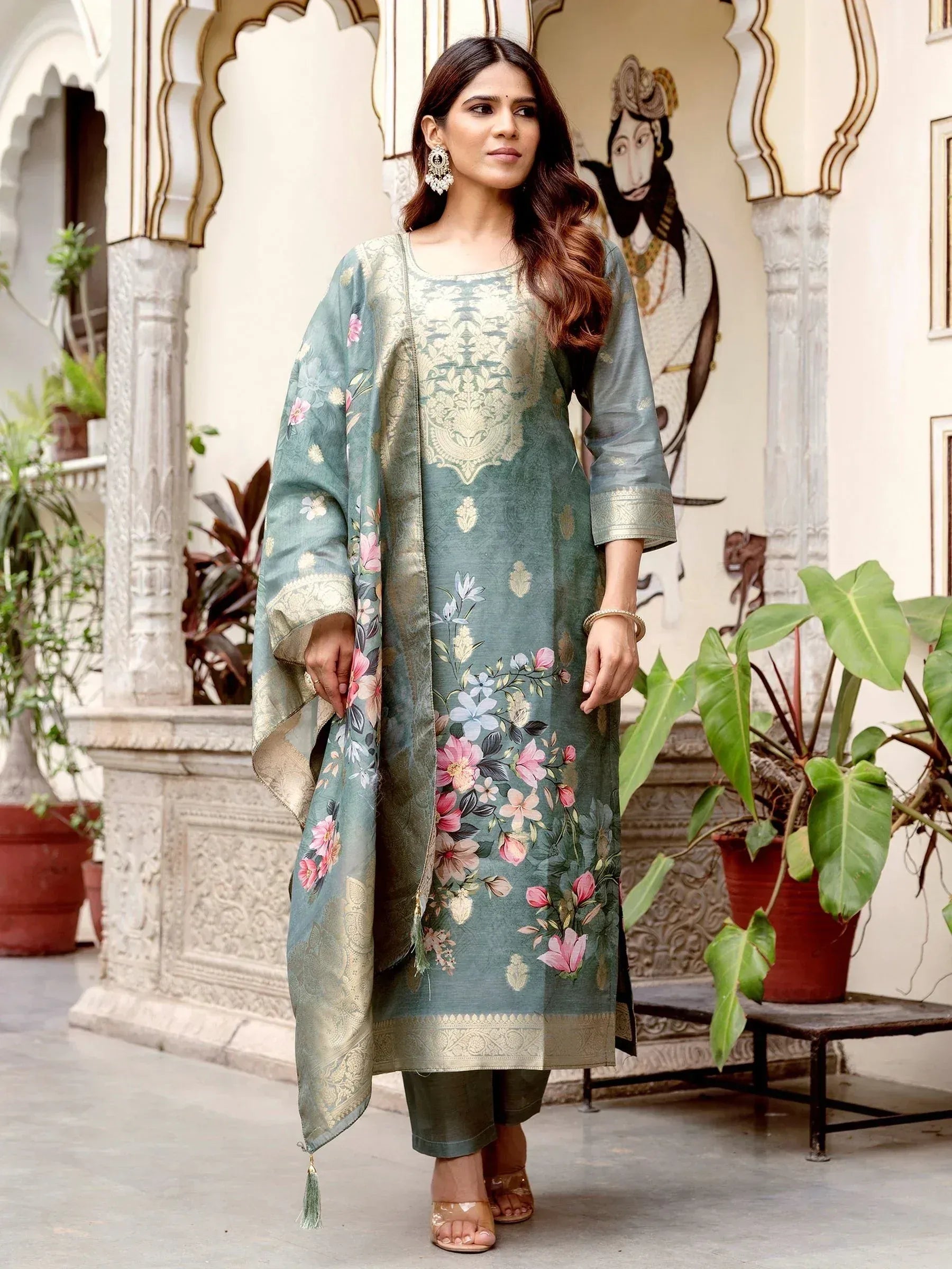 Elegant teal floral print salwar kameez with gold embroidery, perfect for Indian ethnic wear occasions.