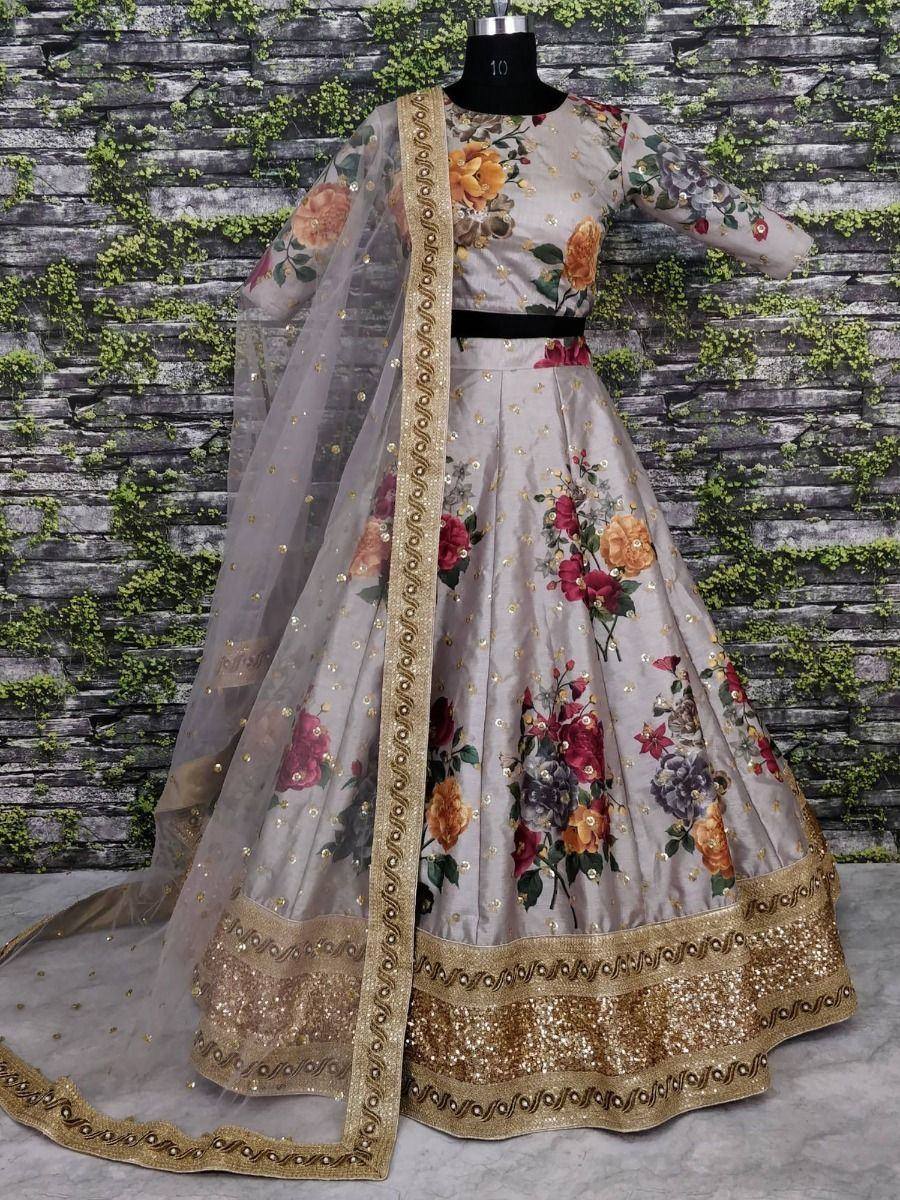 Floral print lehenga choli with gold embroidery and sheer dupatta, perfect for Indian ethnic occasions