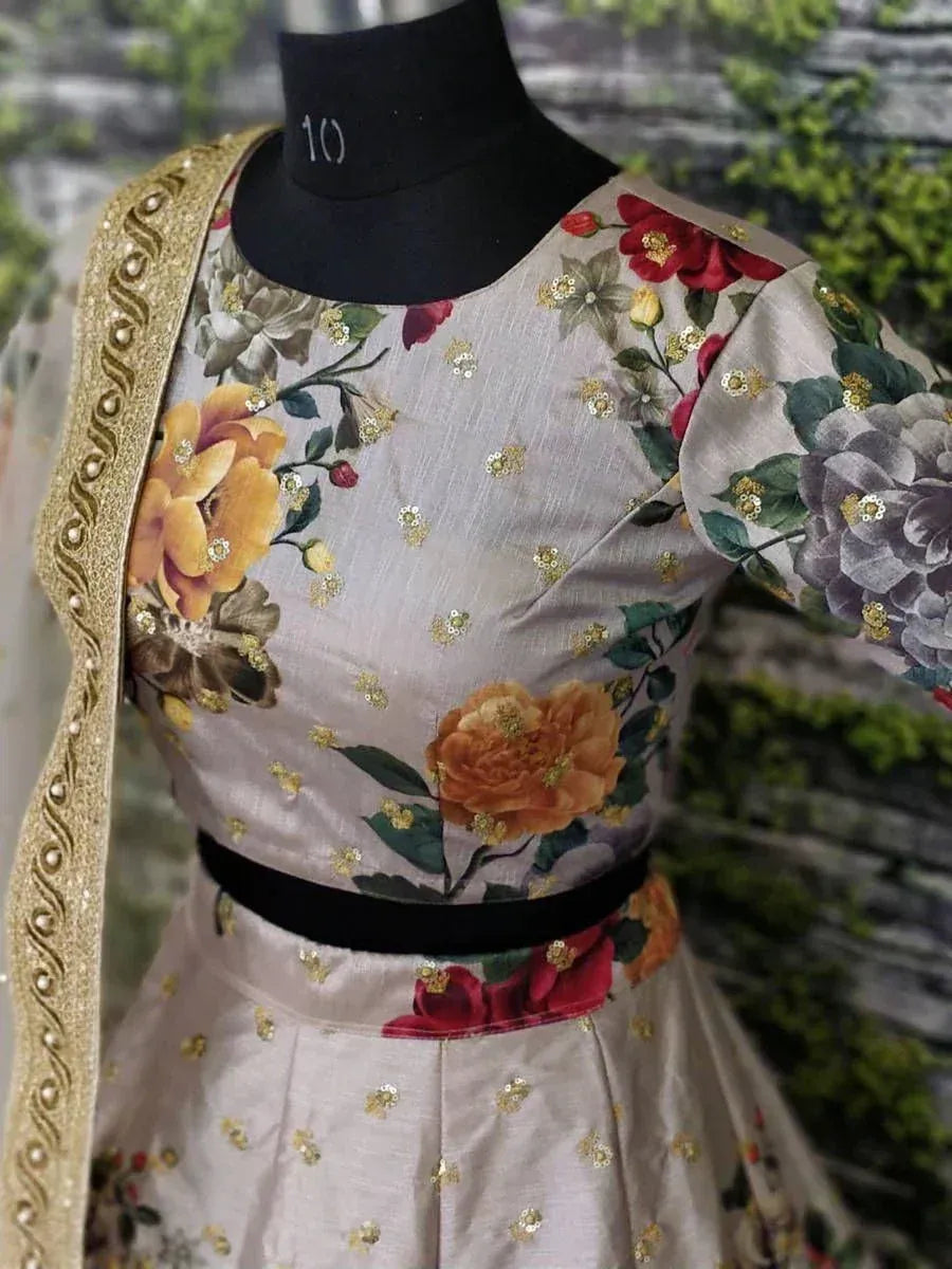 Floral printed ethnic gown with gold embellishments and black waistband, perfect for Indian occasions