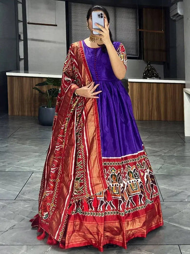 Enchanting Purple Patola Printed Dola Silk Traditional Gown With Dupatta