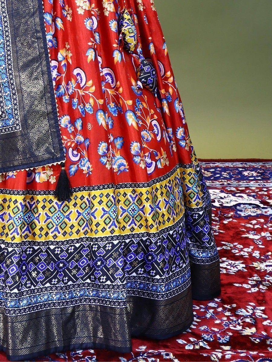 Red floral lehenga with blue and yellow geometric border, ethnic Indian wear