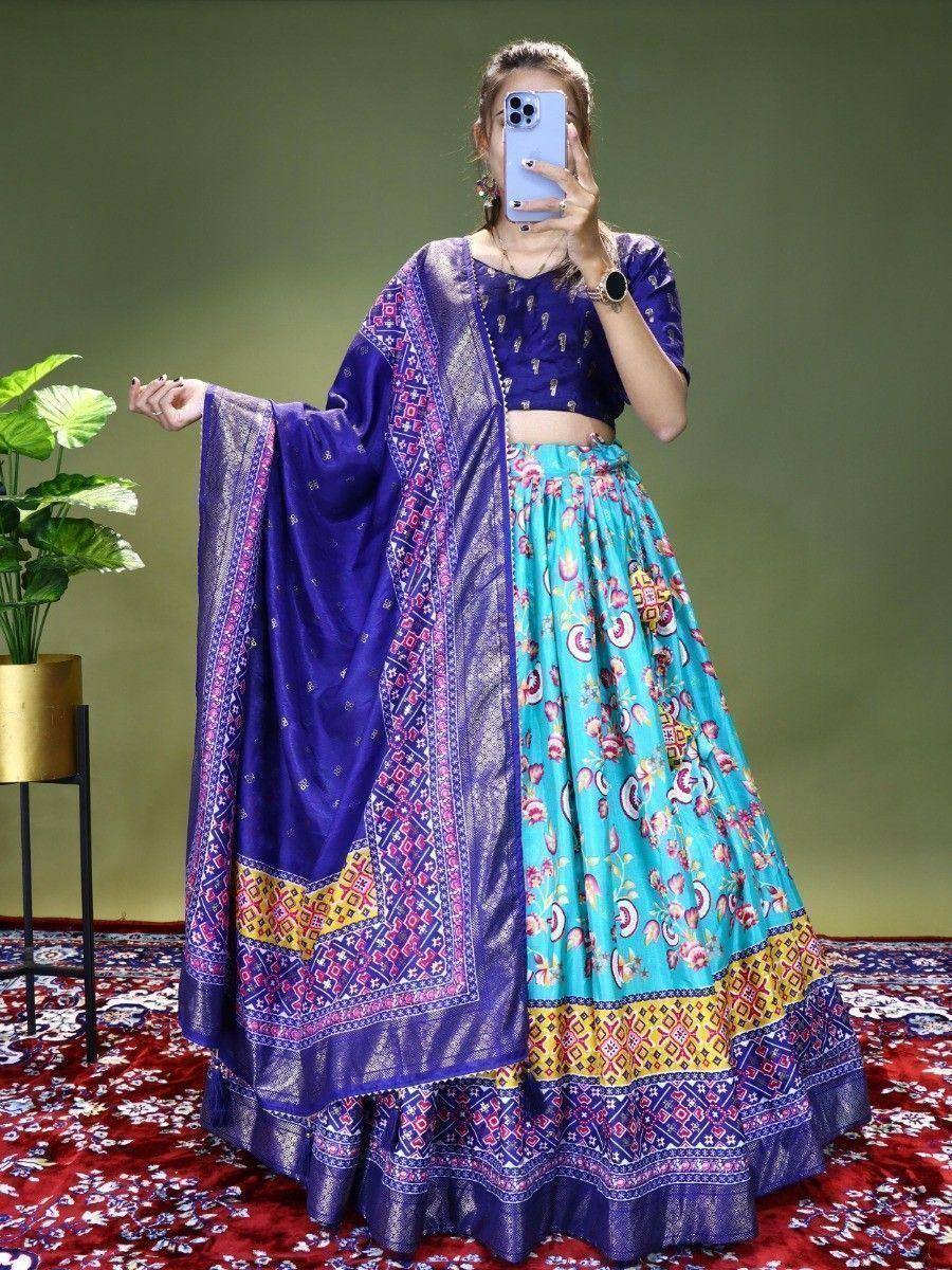 Blue and turquoise printed lehenga choli with ethnic dupatta, perfect for Indian weddings and festive occasions