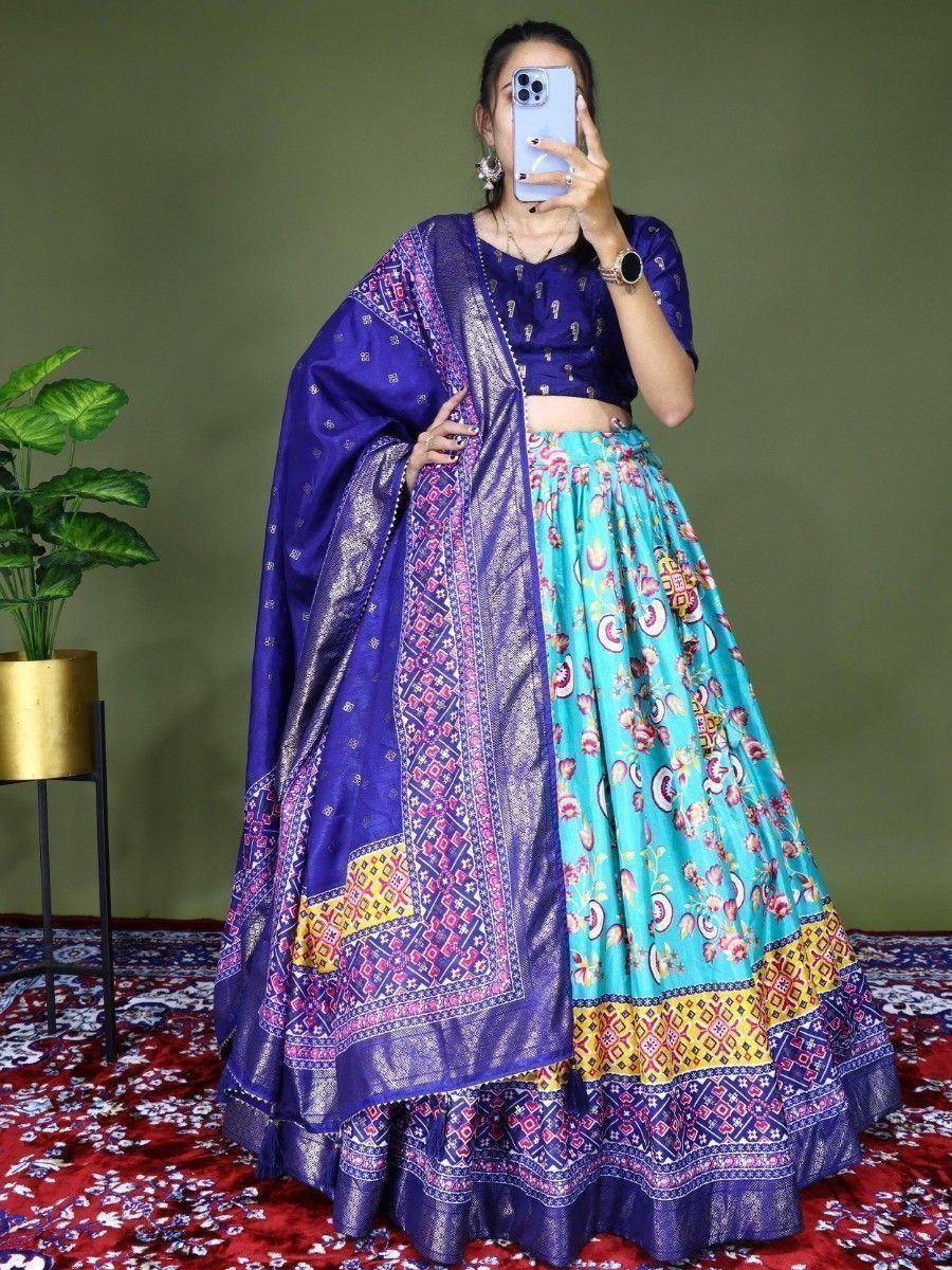Purple and turquoise printed lehenga choli with embroidered dupatta, perfect for Indian ethnic occasions