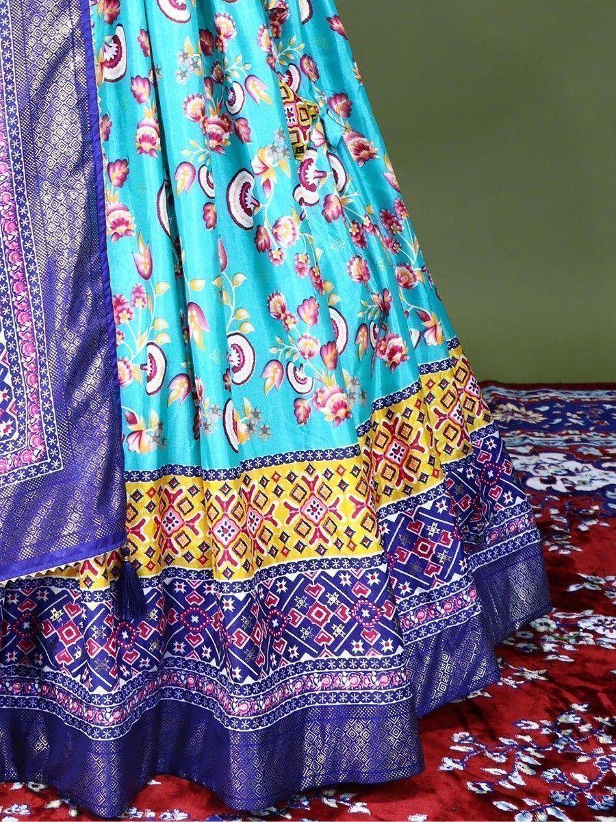 Turquoise floral lehenga with purple border and geometric print, ethnic Indian wear