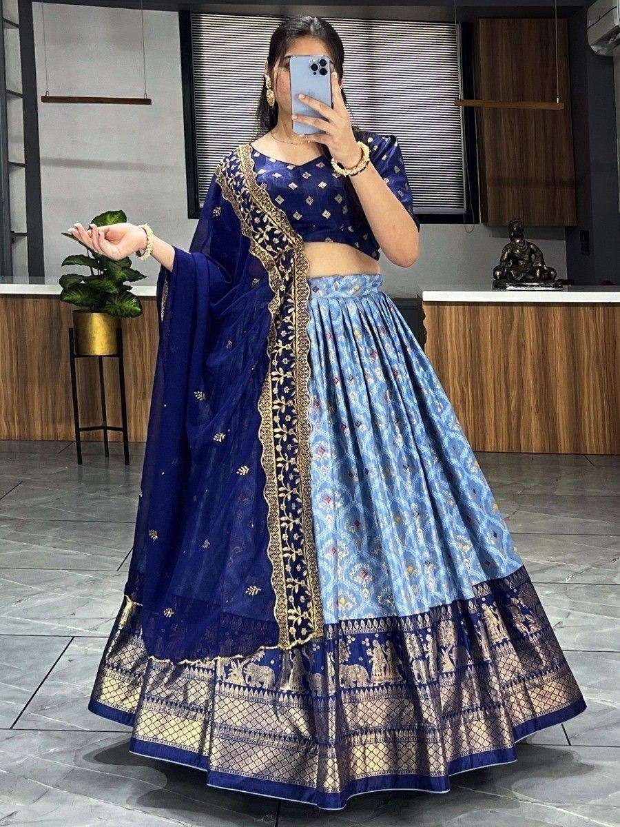 Blue designer lehenga choli with gold embroidery and elephant motifs, perfect for Indian ethnic wear