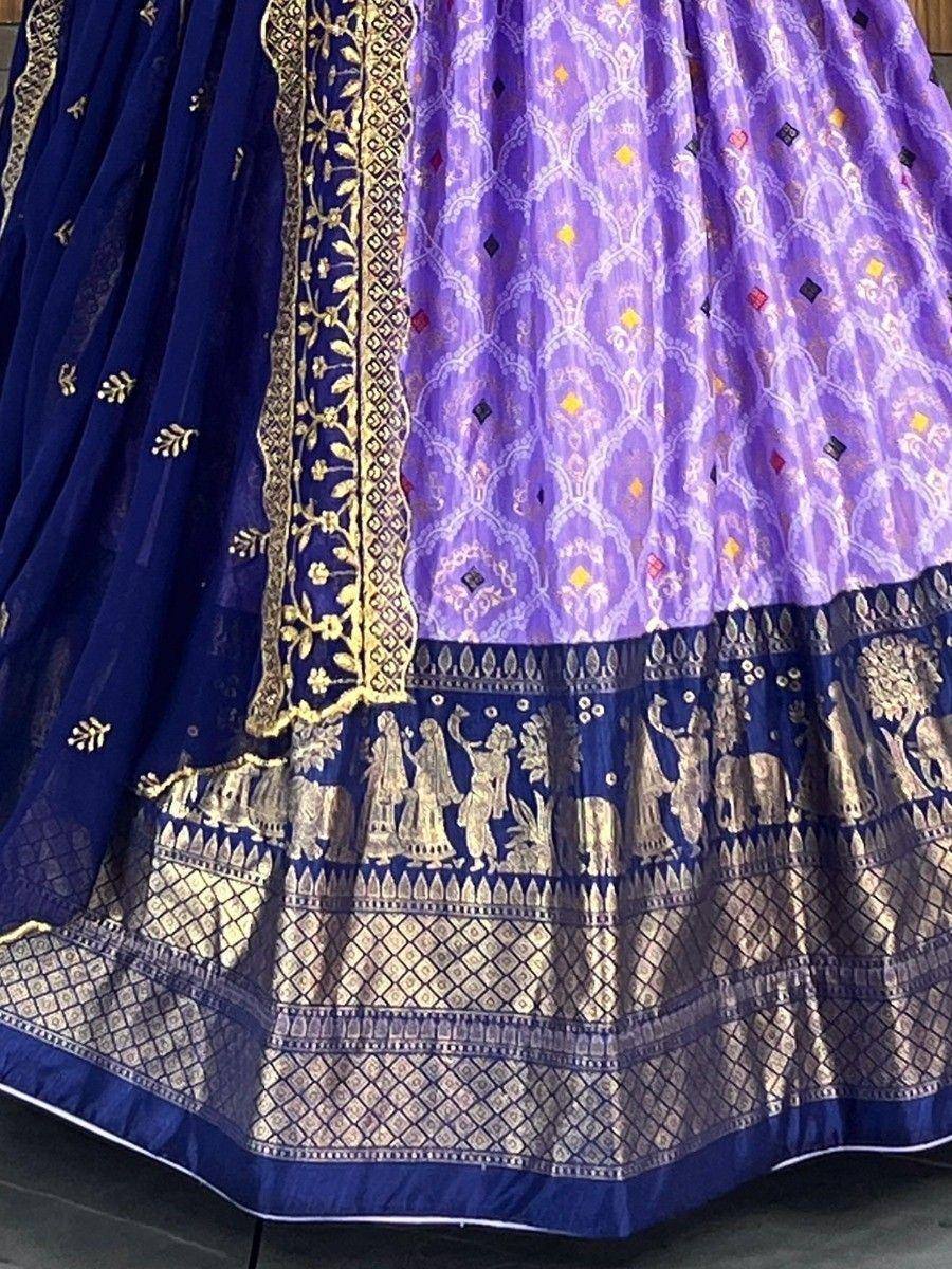 Blue and purple designer lehenga with gold embroidery and elephant motifs, ethnic Indian wear