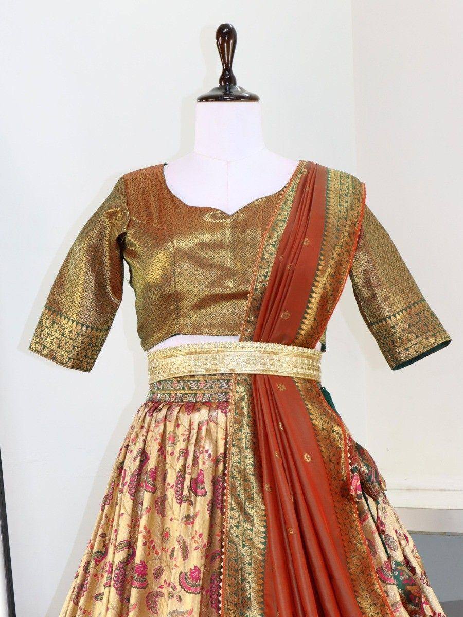 Golden embroidered lehenga choli with red dupatta, ethnic Indian wear for festive occasions