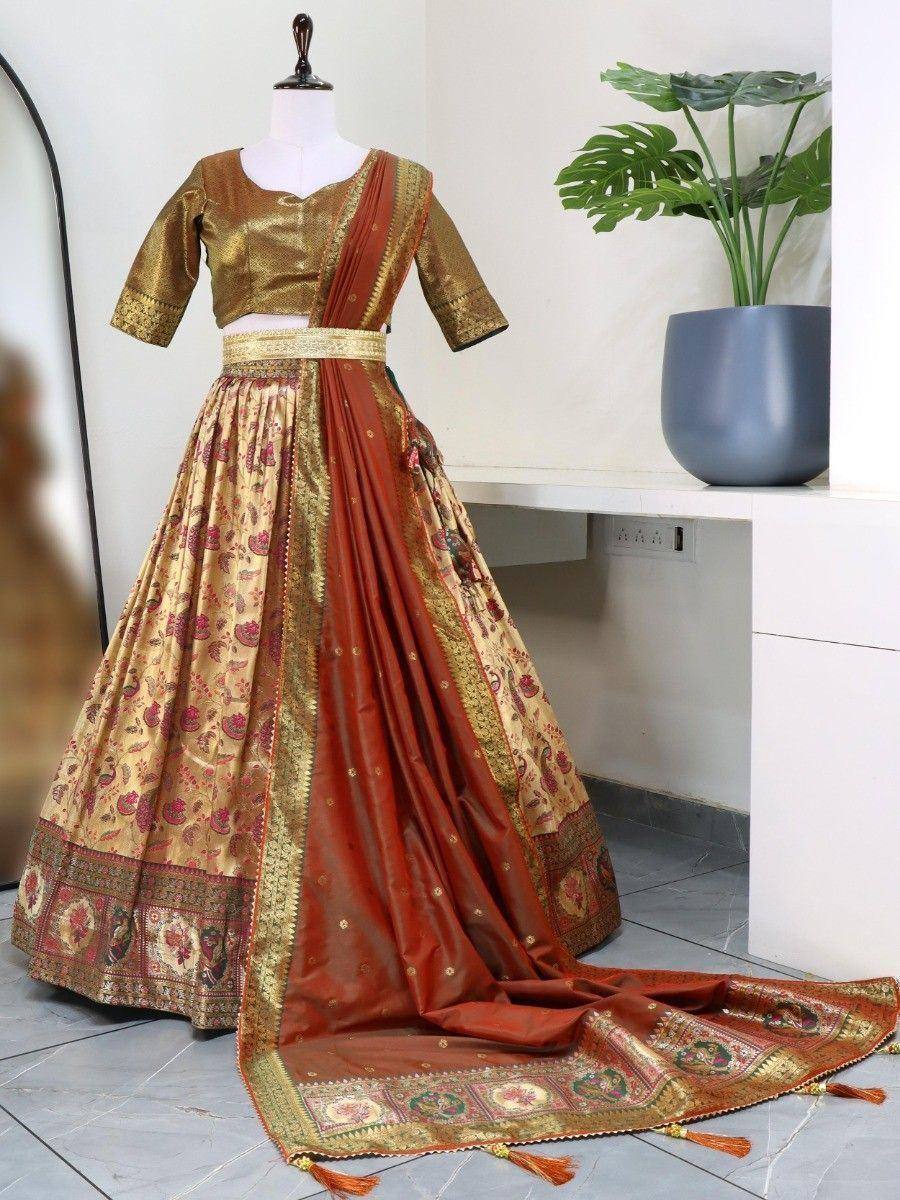 Designer lehenga choli with gold blouse, printed skirt, and maroon dupatta for Indian ethnic wear