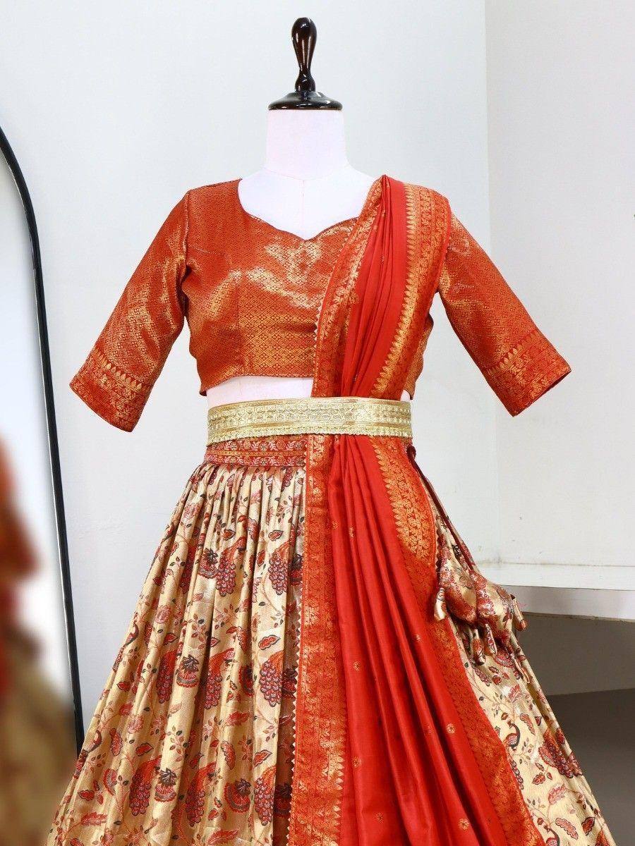 Orange and gold designer lehenga choli with floral print skirt and embroidered blouse