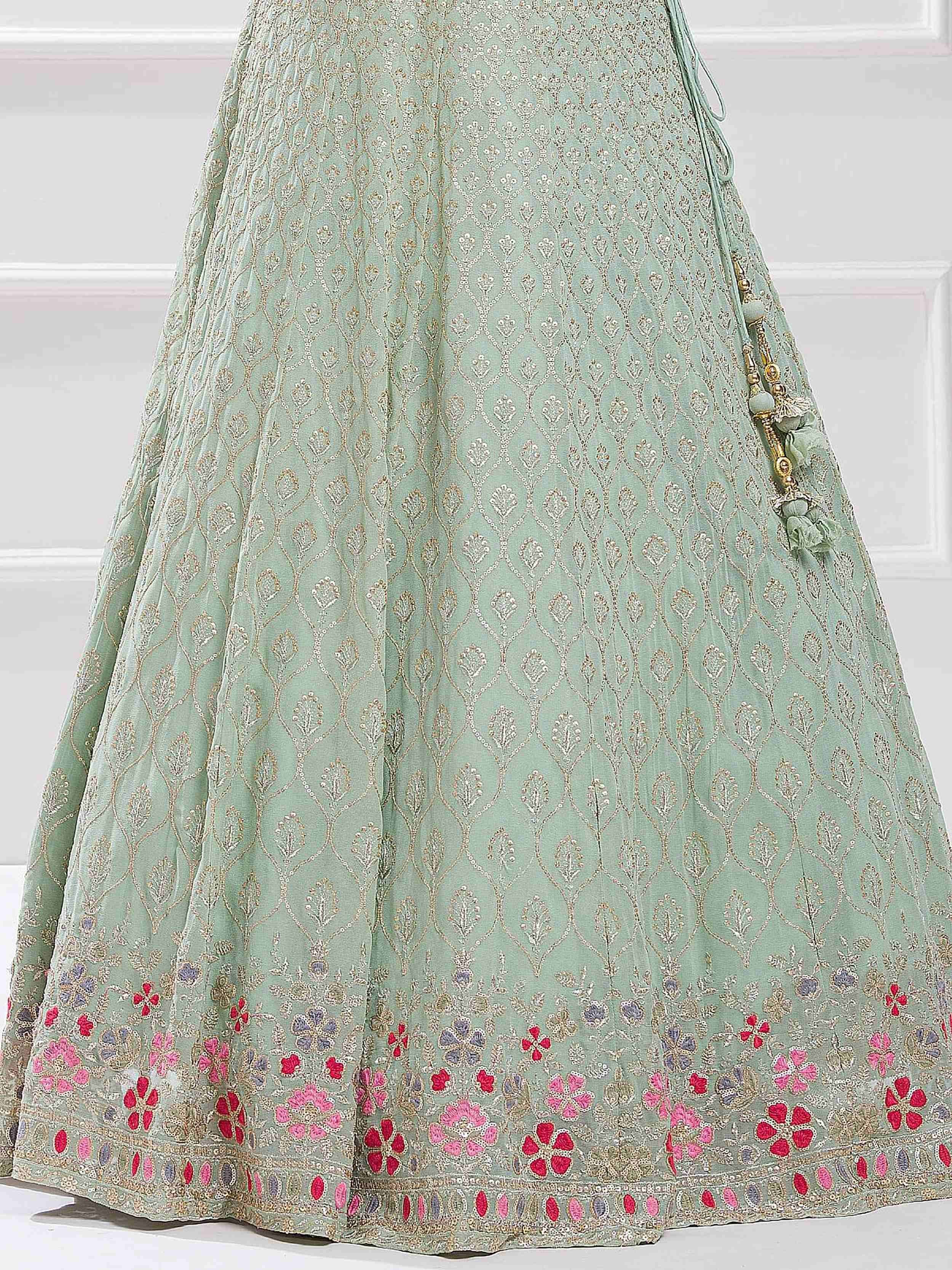 Mint green embroidered lehenga with floral border and tassels, Indian ethnic wear
