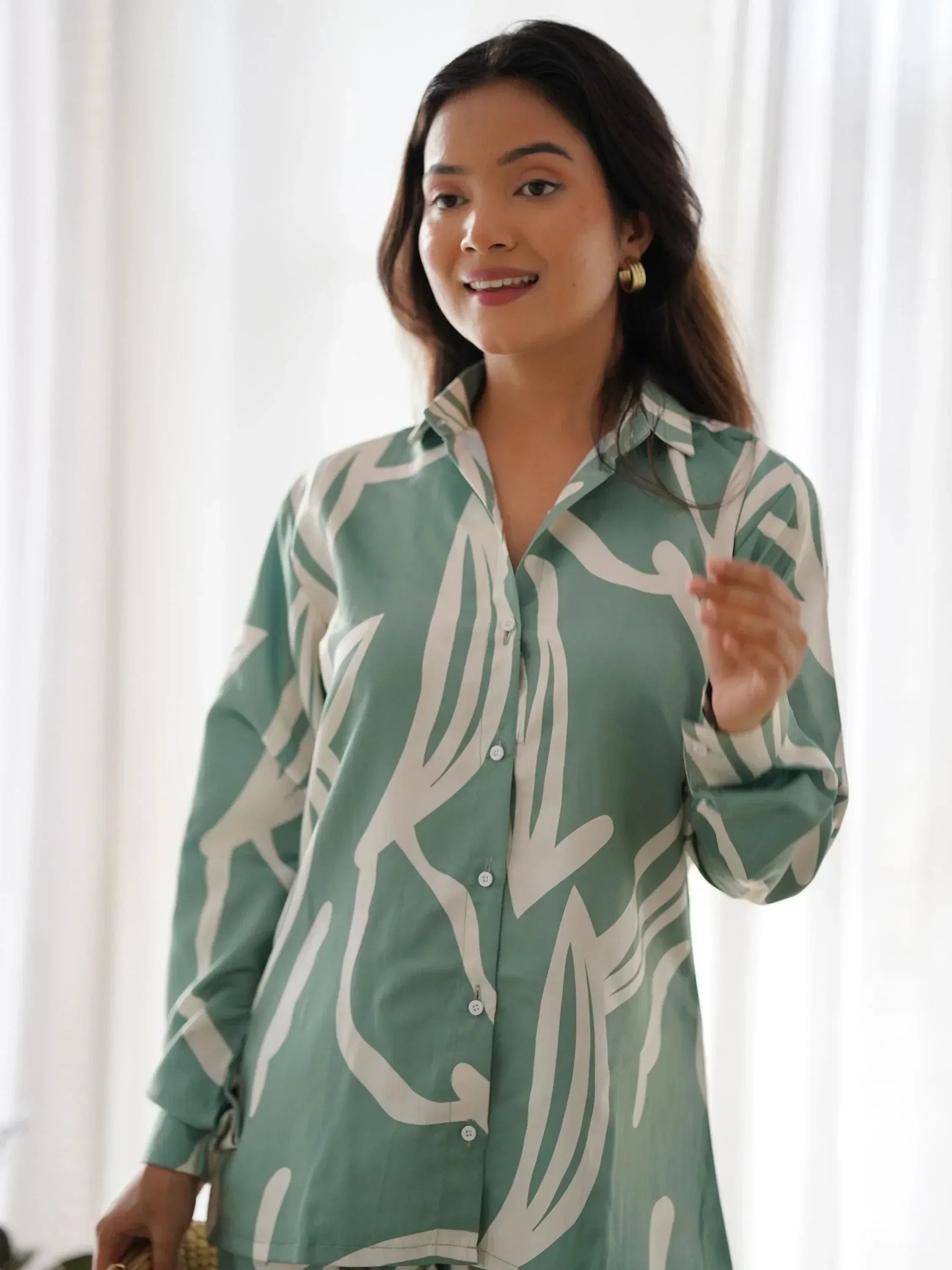 Green and white printed ethnic shirt with abstract design, stylish and comfortable wear