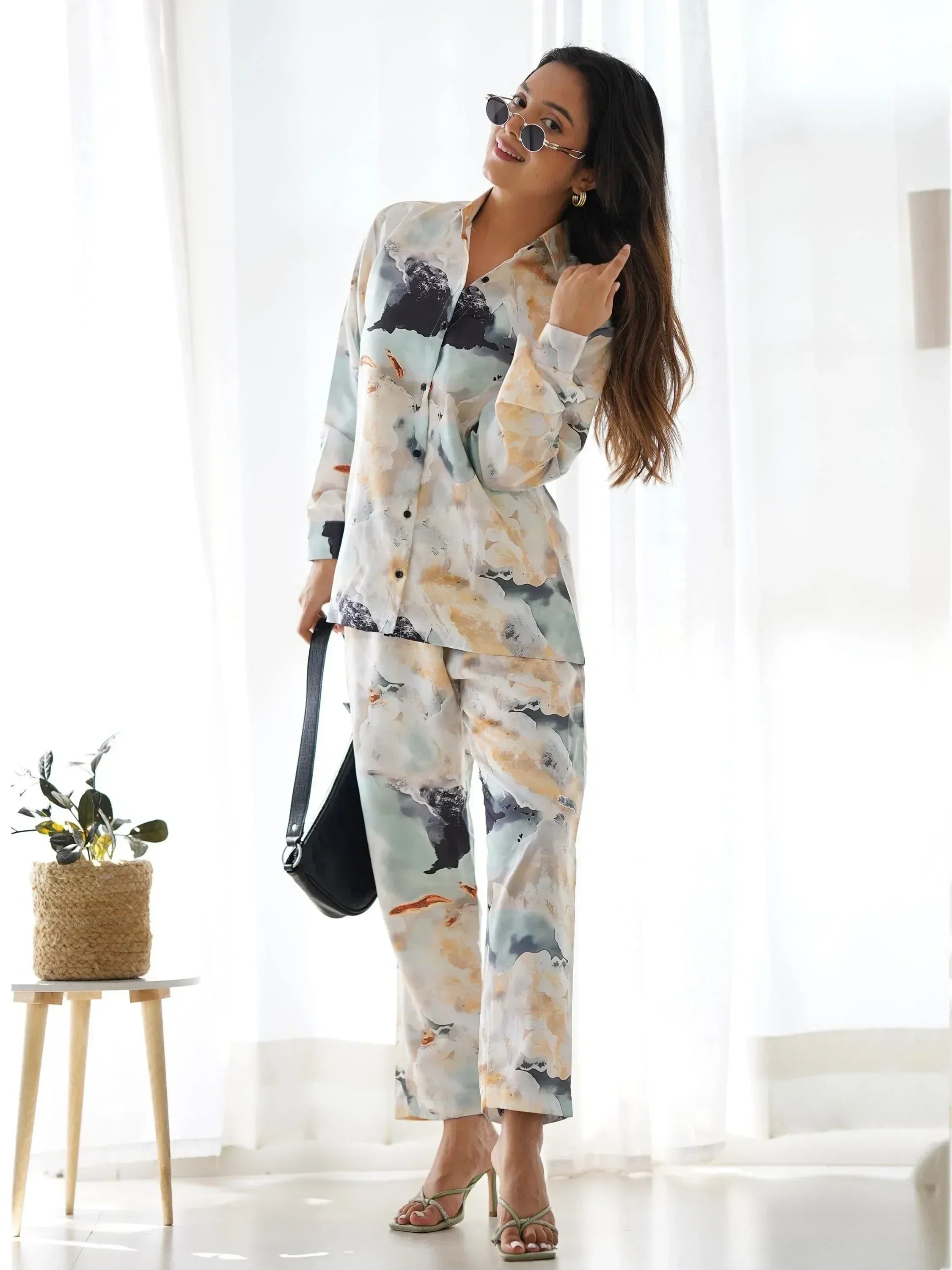Woman in stylish printed ethnic pantsuit with abstract design, perfect for casual or semi-formal wear