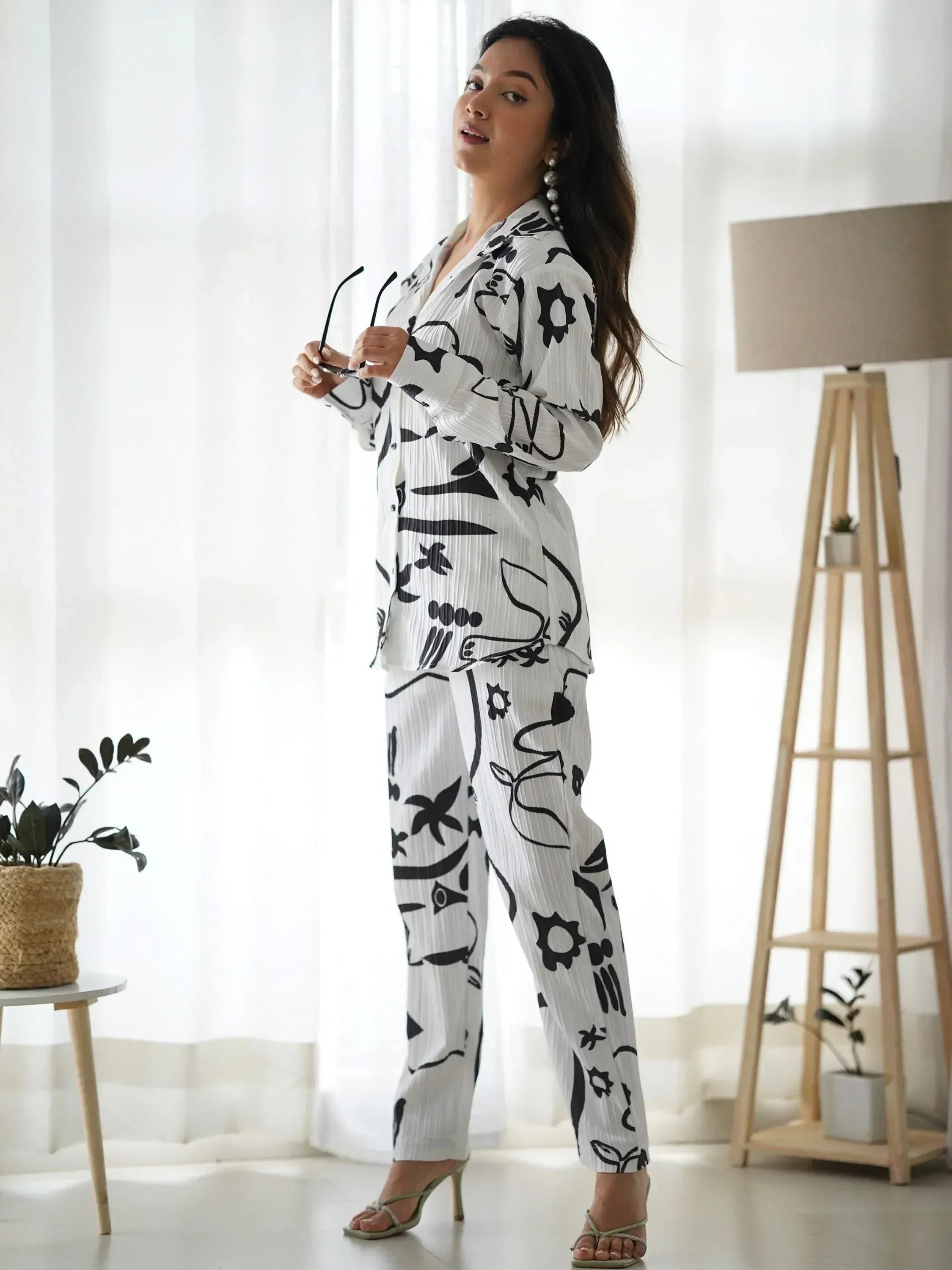 White and black floral print ethnic palazzo suit with pleated fabric, stylish for casual wear