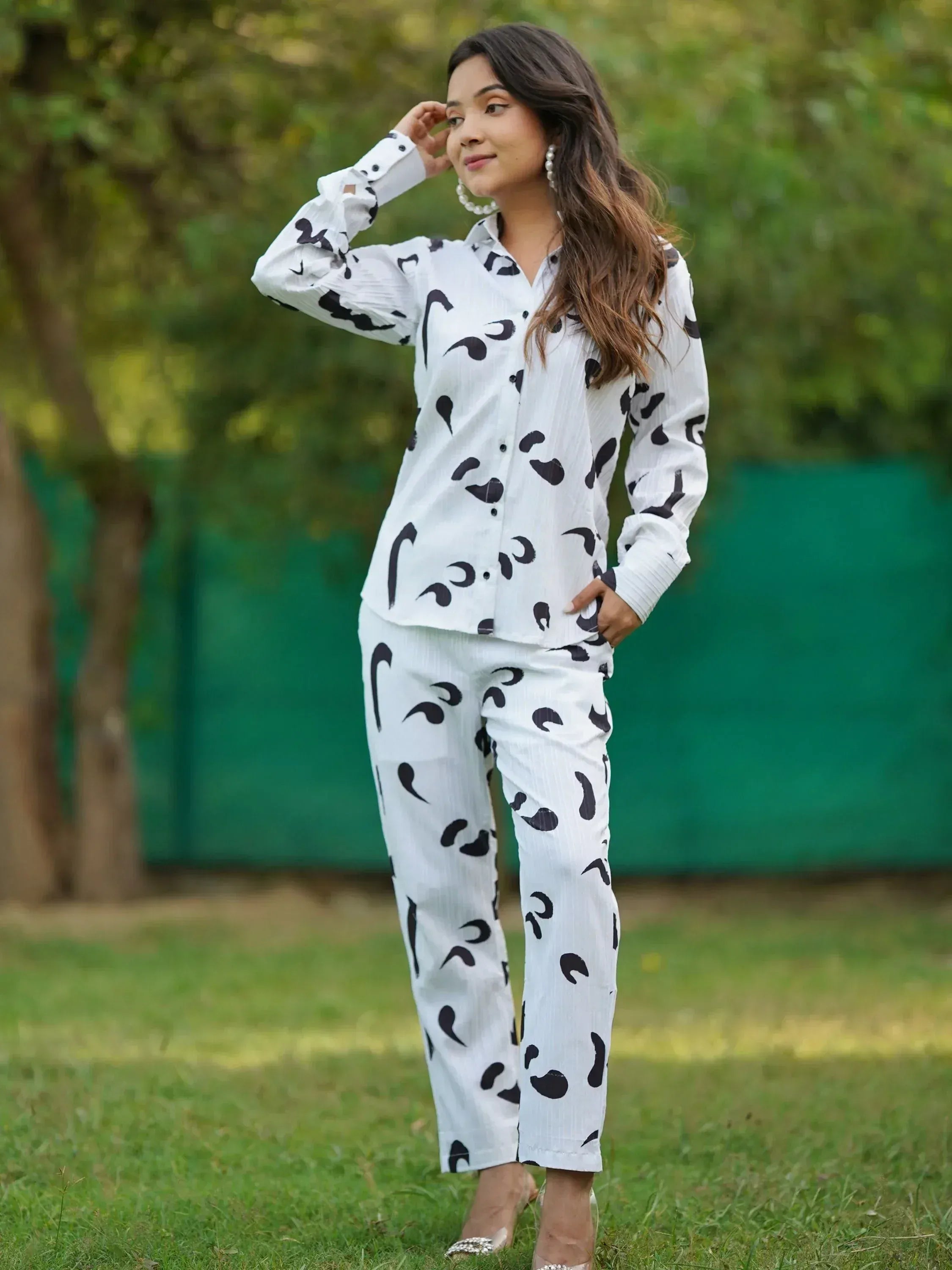 Woman in white and black printed ethnic pantsuit, stylish salwar kameez alternative for casual wear