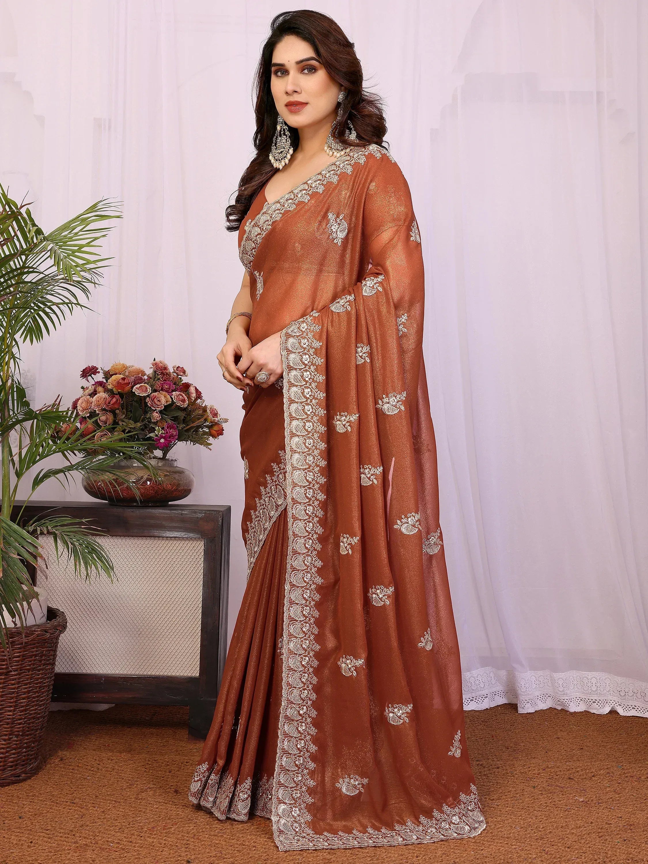 Awesome Brown Zari Embroidered Georgette Saree With Blouse
Rich text editor