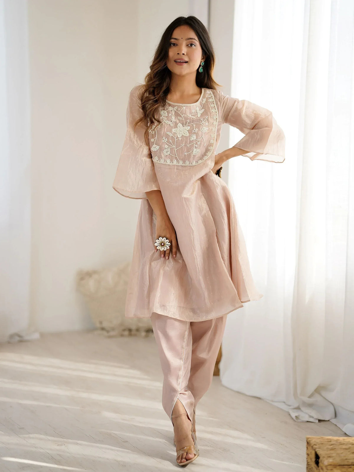 Elegant pink ethnic kurta with floral embroidery and flared sleeves, paired with matching pants