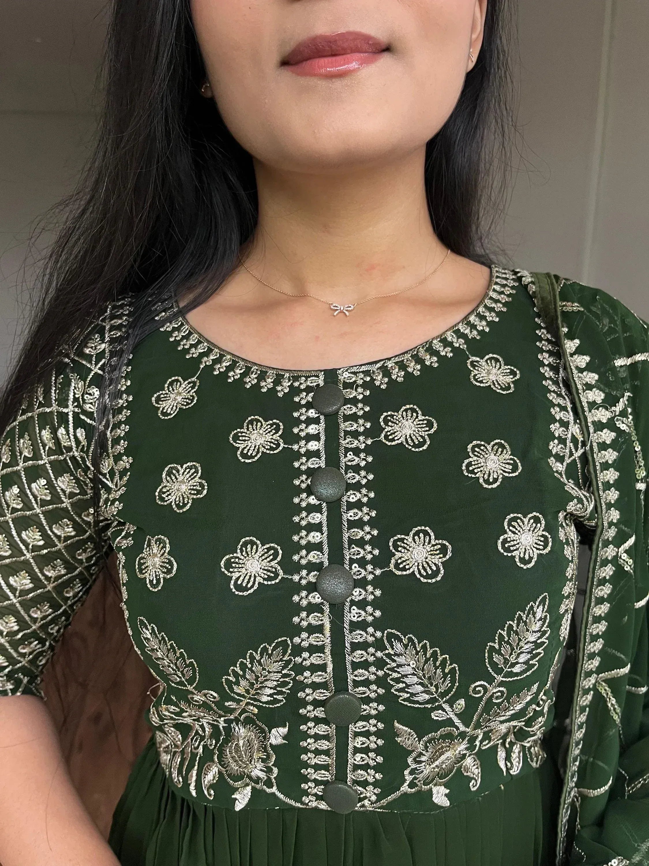 Green embroidered ethnic kurti with floral zari work and button front, perfect for Indian wear