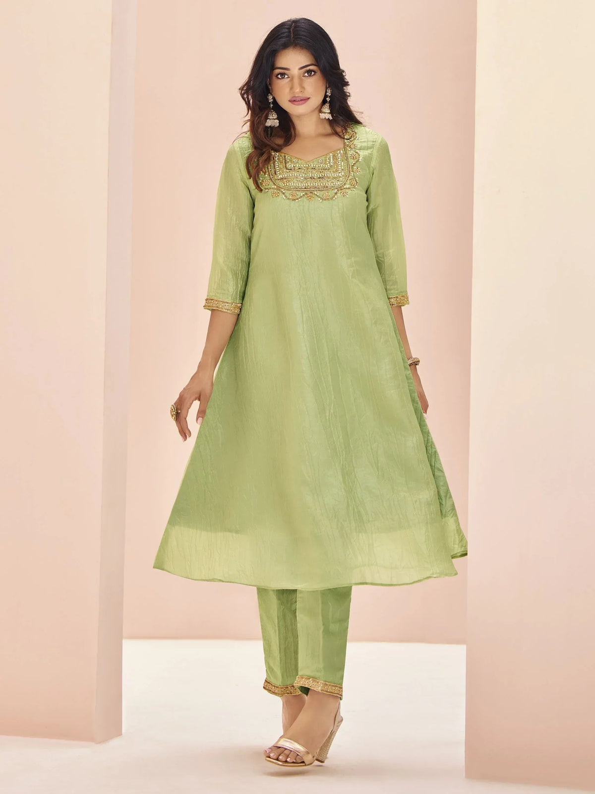 Light green ethnic kurta with gold embroidery and matching pants for women