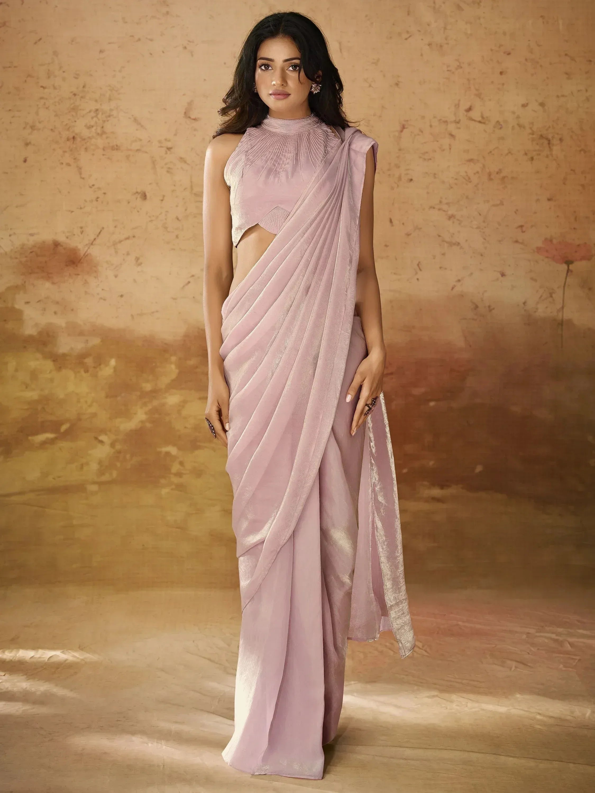 Elegant pink saree with pleated high-neck blouse, perfect for Indian ethnic occasions
