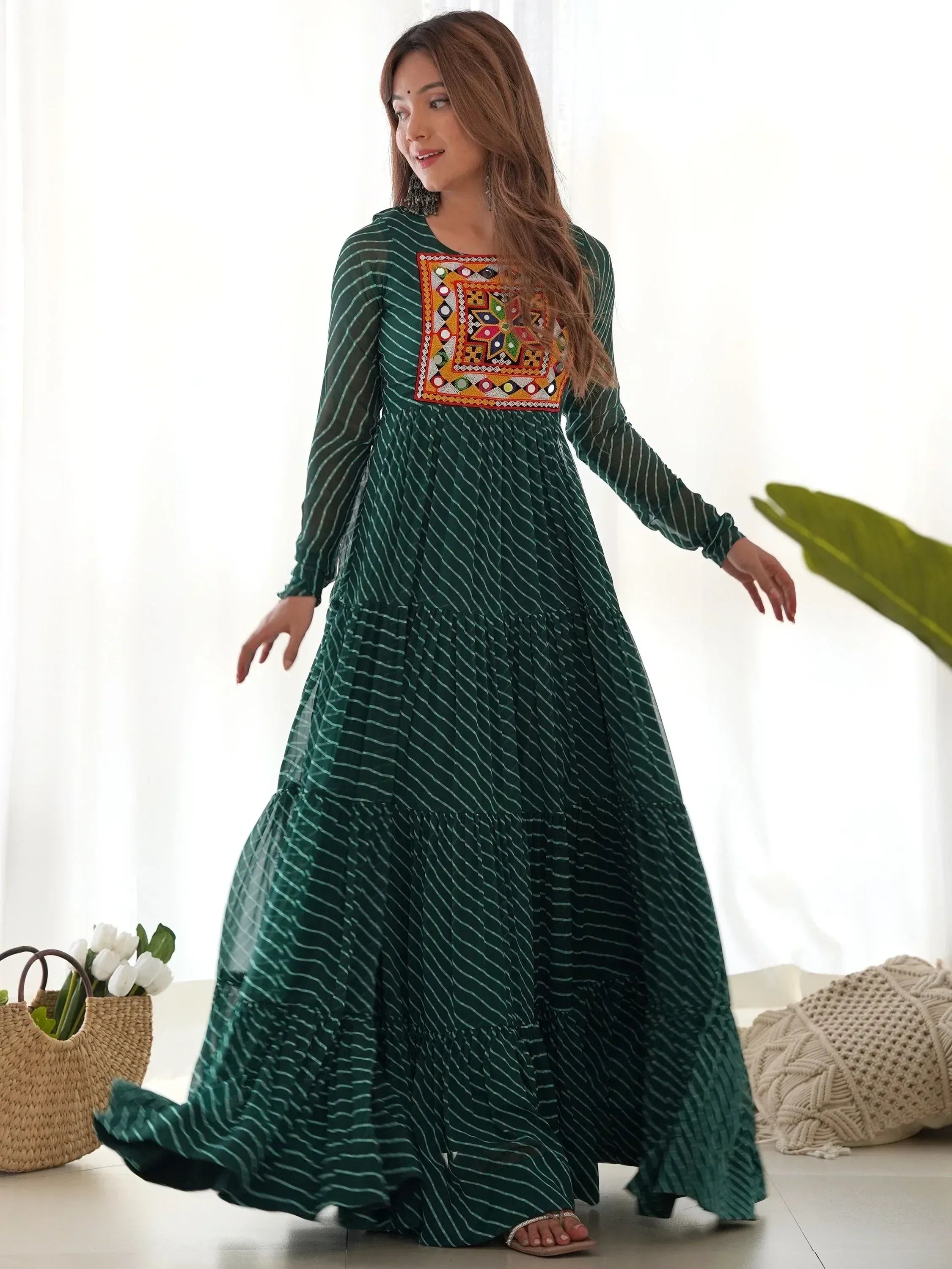 Green striped ethnic gown with colorful mirror work, perfect for Indian festive wear and casual occasions.