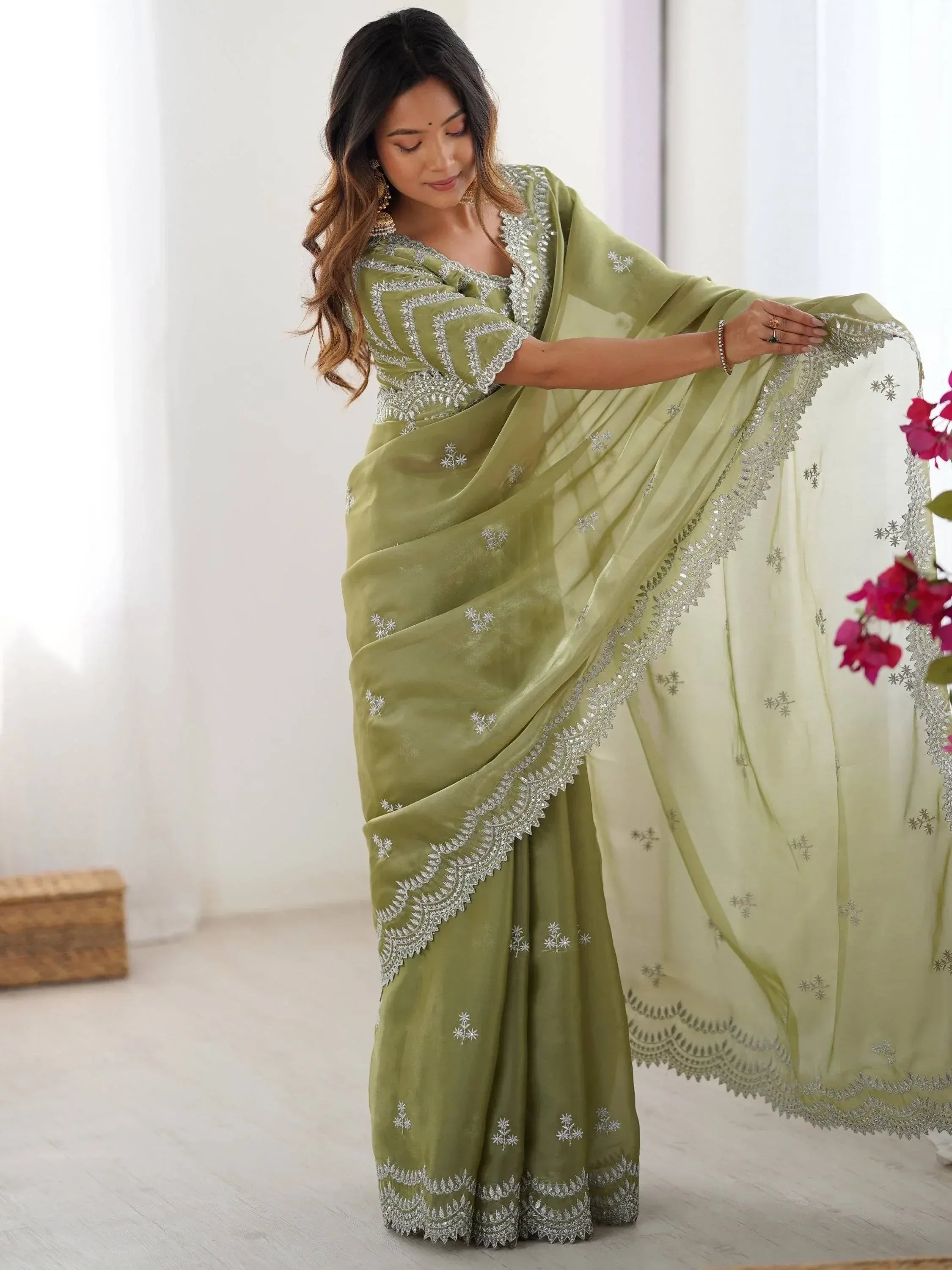Olive green embroidered saree with silver zari work, perfect for Indian ethnic occasions