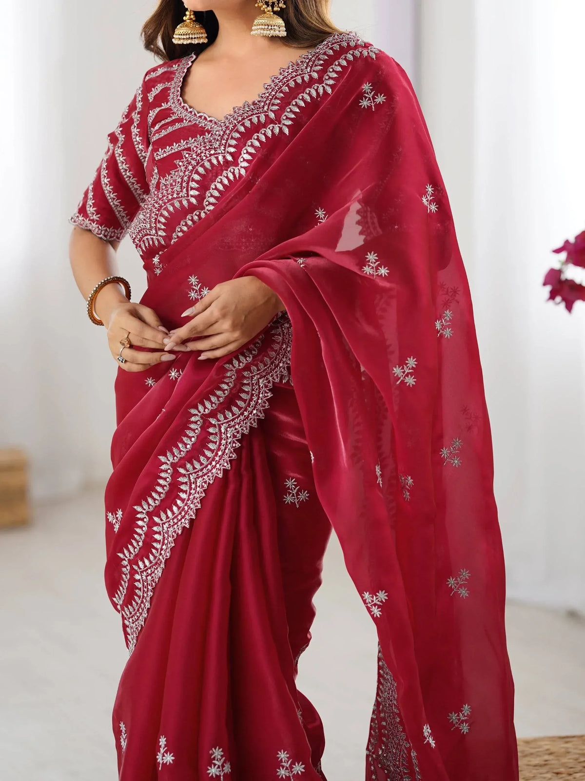 Red embroidered saree with silver floral work, perfect for Indian ethnic occasions