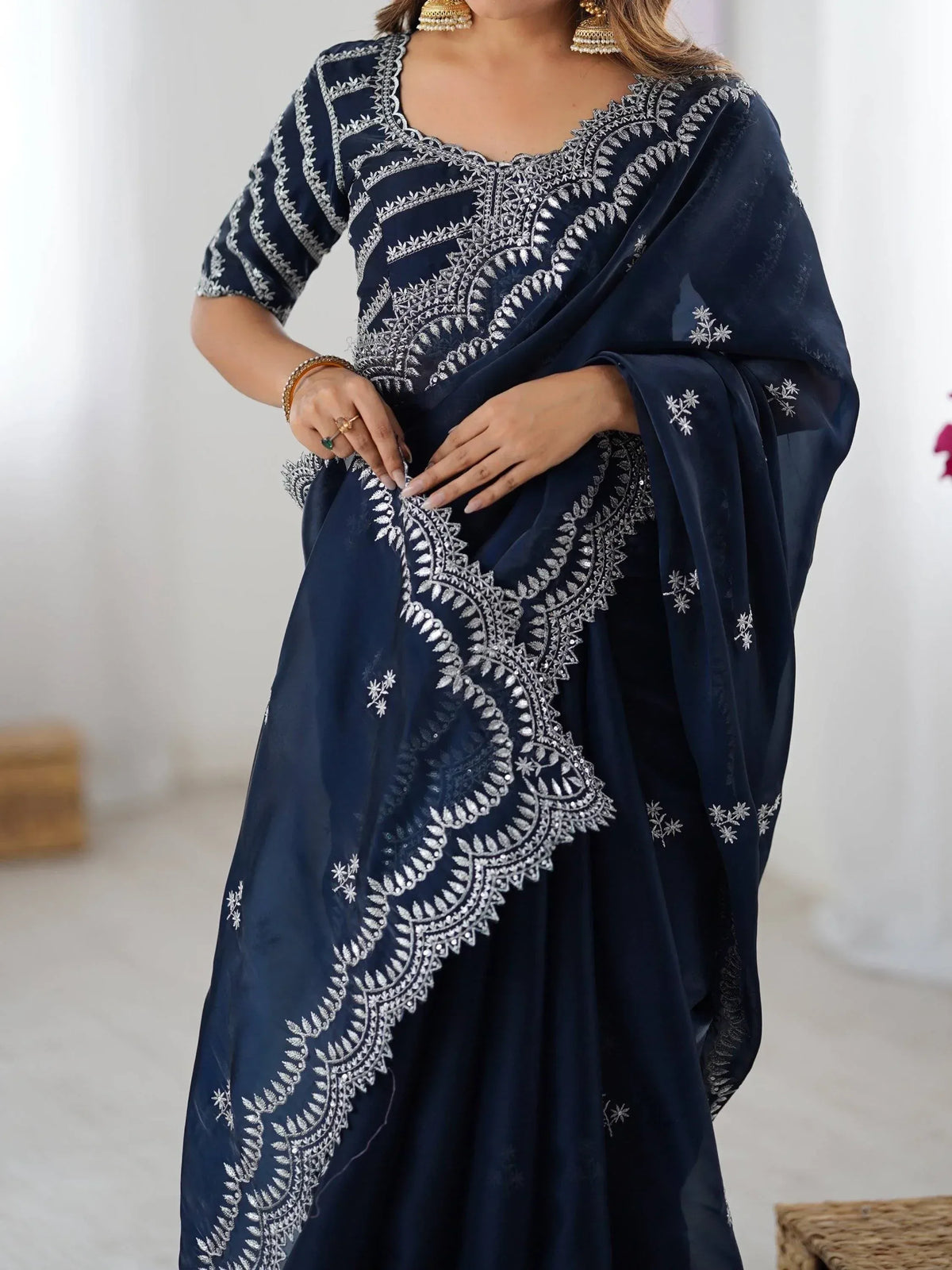 Navy blue embroidered ethnic gown with silver leaf detailing, perfect for Indian occasions