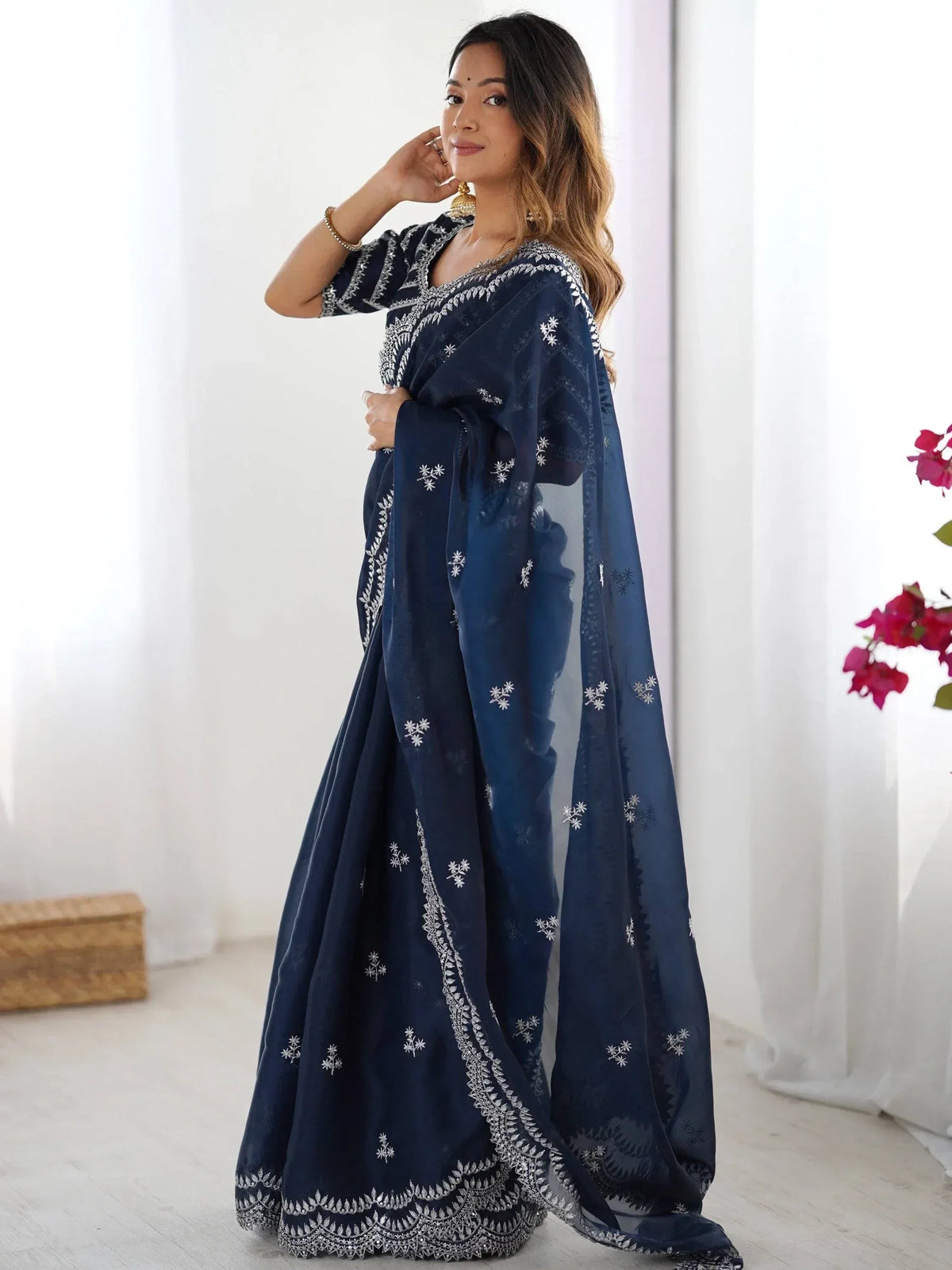 Navy blue embroidered lehenga choli with floral motifs, perfect for Indian ethnic wear occasions