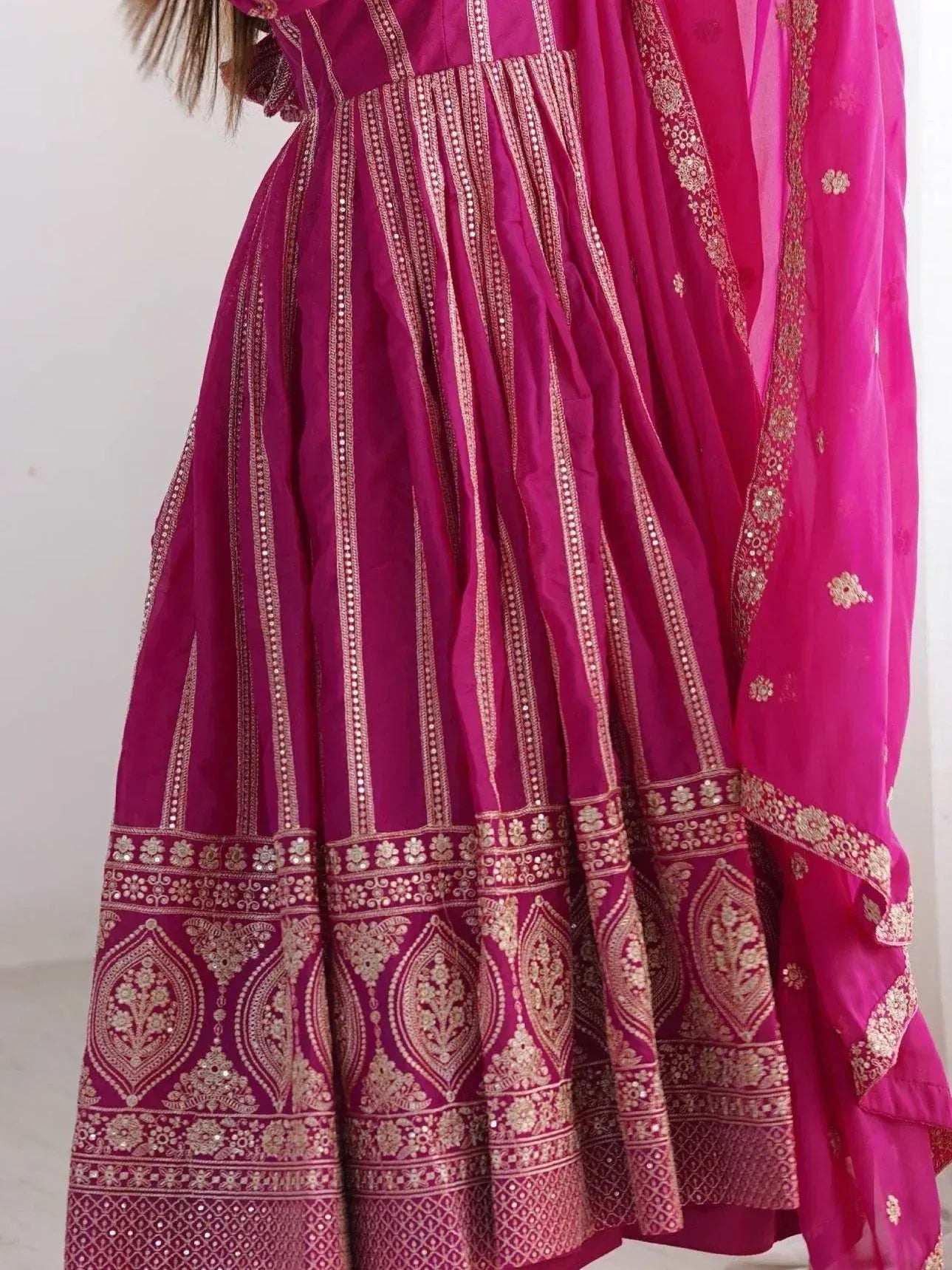Fuchsia designer lehenga choli with gold embroidery and mirror work, ethnic Indian wear