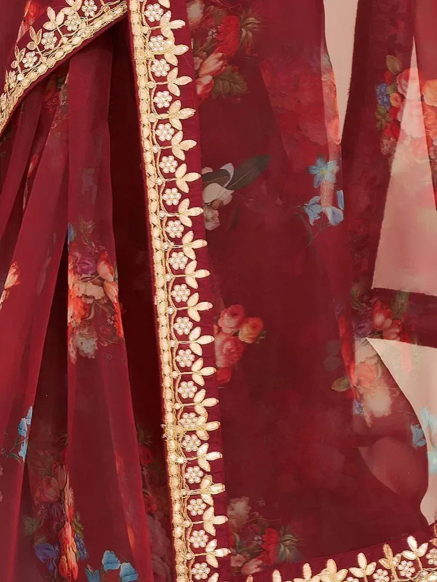 Maroon floral print ethnic gown with gold embroidery detailing
