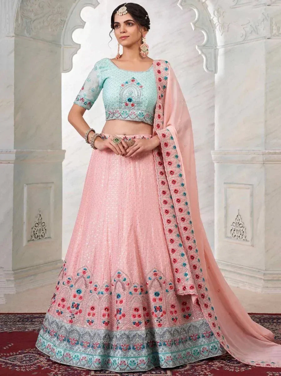 Pink and mint designer lehenga choli with floral embroidery, perfect for Indian ethnic wear occasions