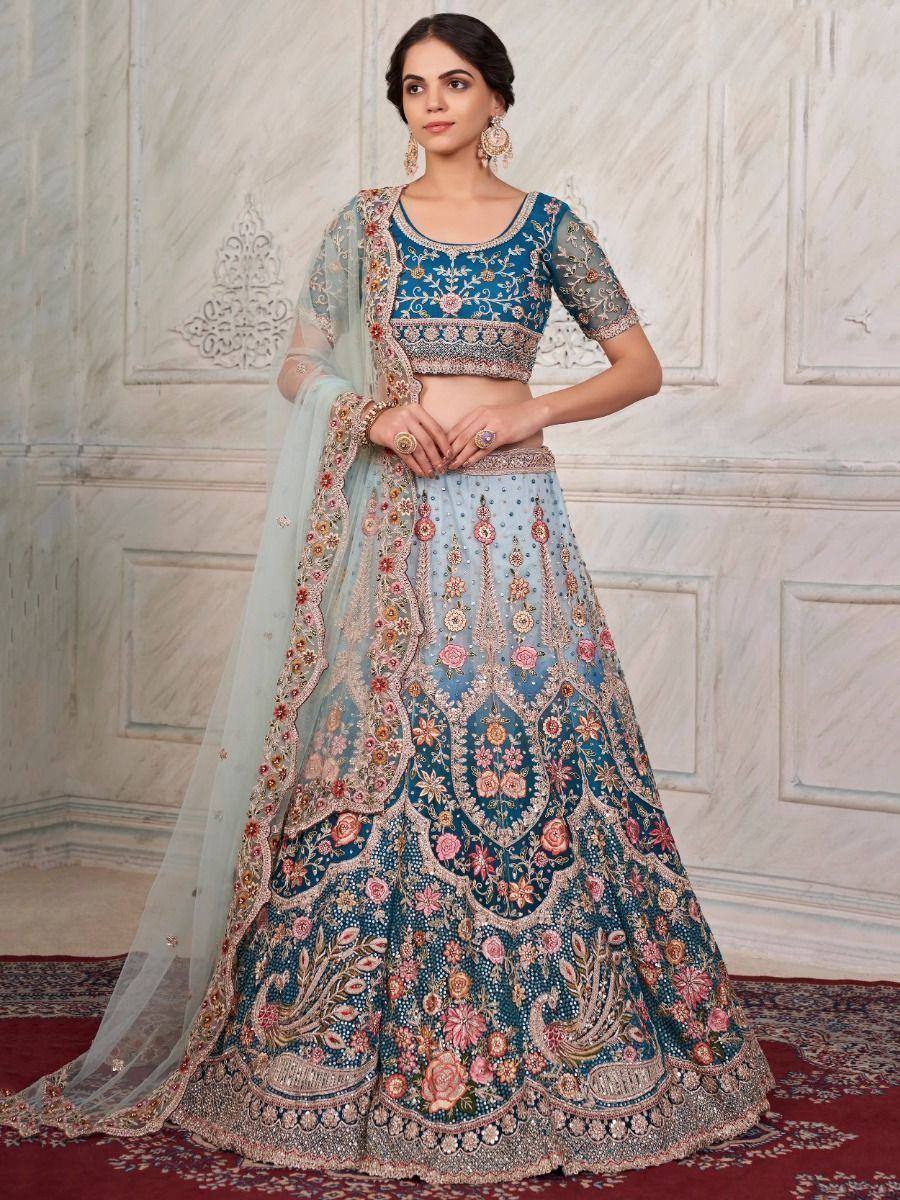 Blue floral embroidered lehenga choli with sheer dupatta, perfect for Indian weddings and festive occasions