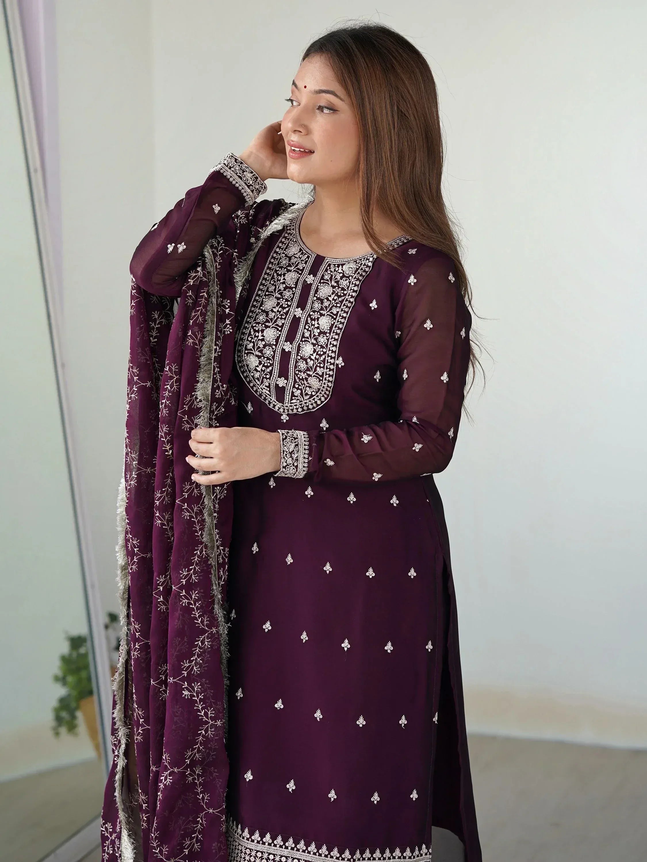 Elegant maroon embroidered salwar kameez with matching dupatta, perfect for Indian ethnic wear occasions.