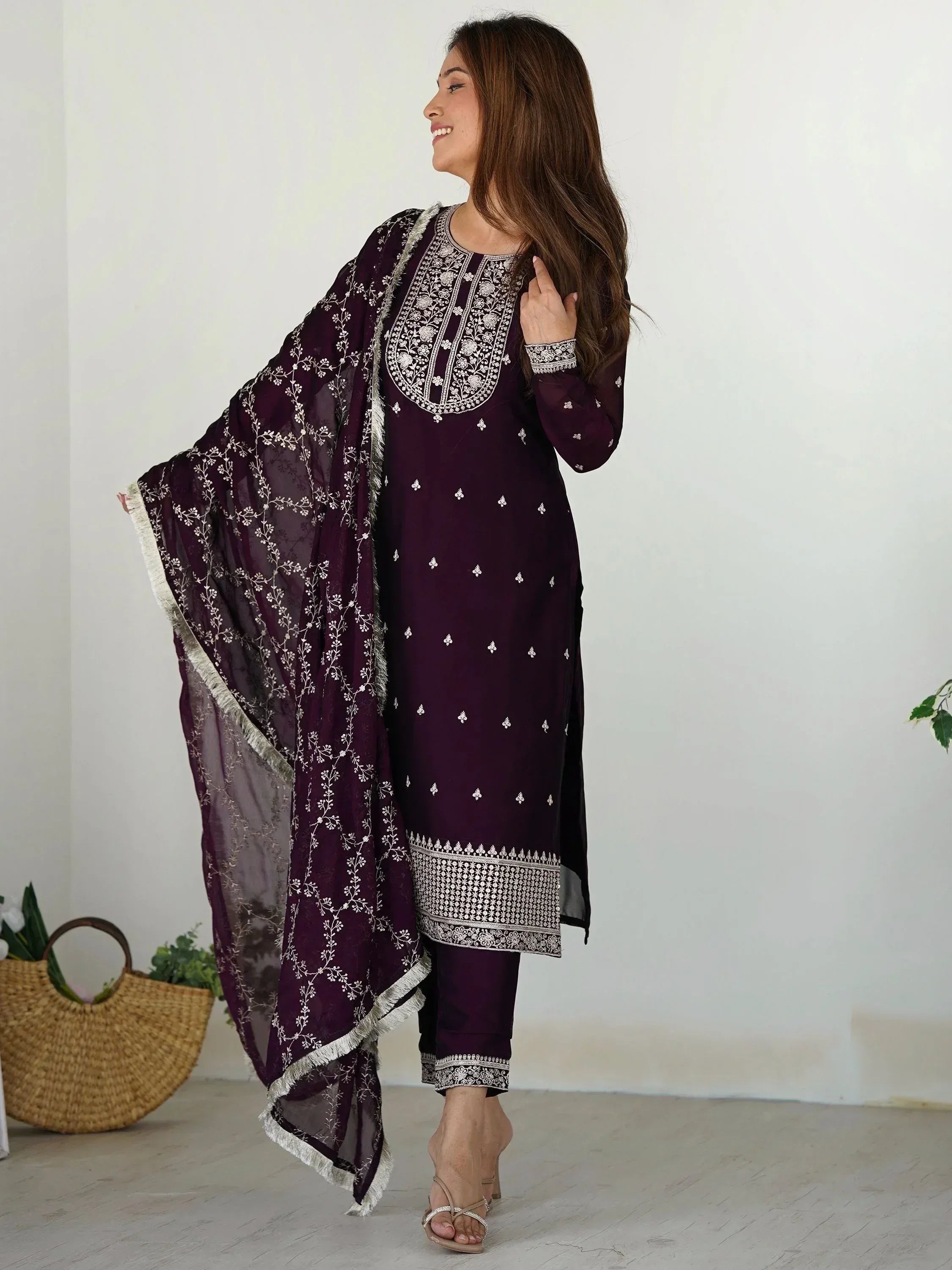 Elegant purple embroidered salwar kameez with matching dupatta, perfect for Indian ethnic wear.