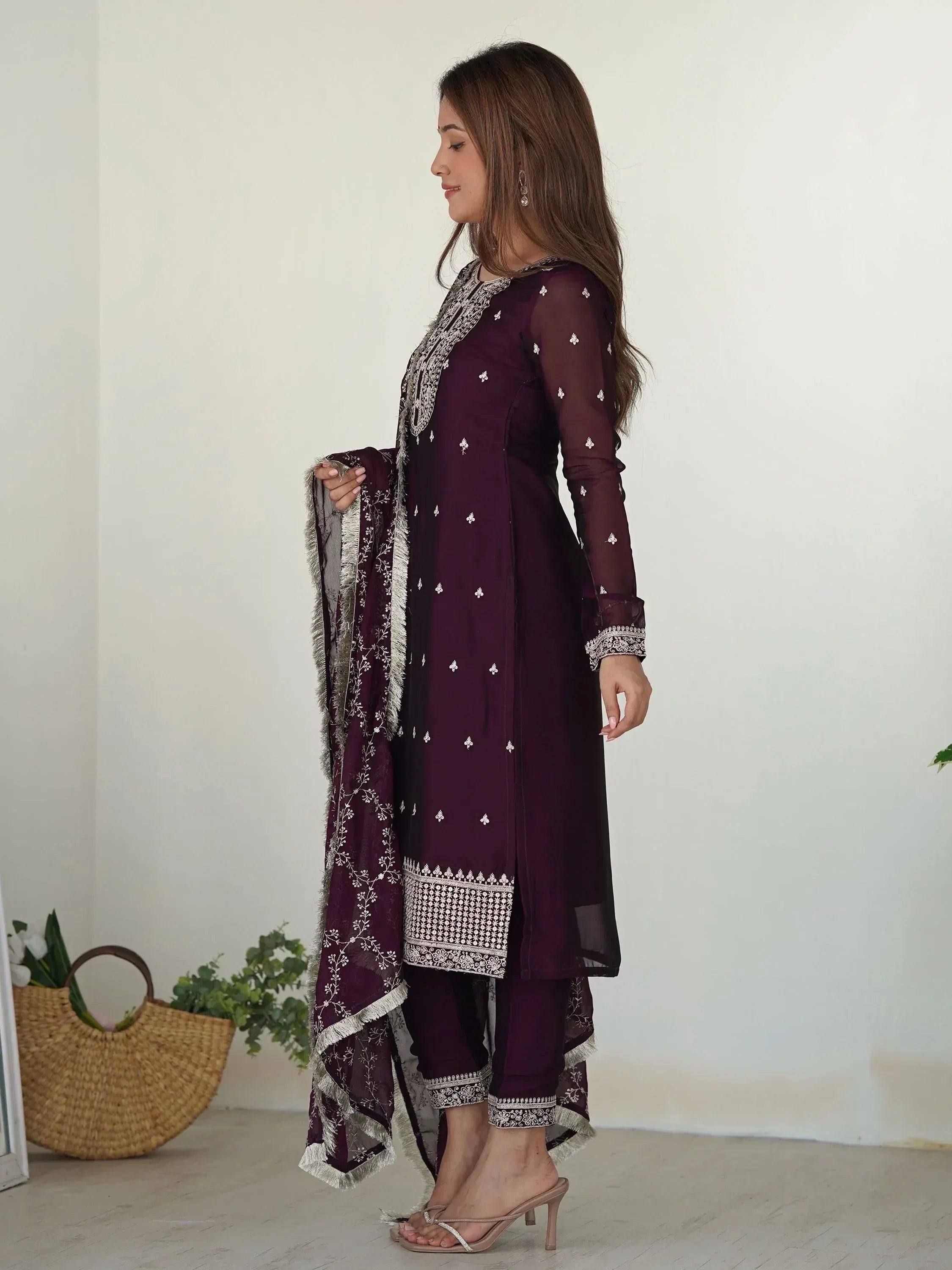 Elegant maroon salwar kameez with white embroidery and matching dupatta, perfect for ethnic occasions.
