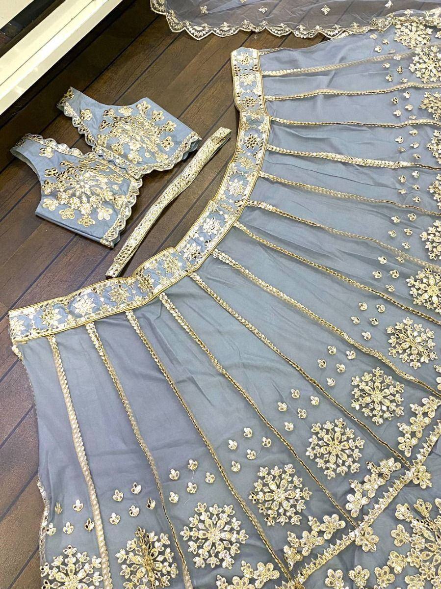 Grey lehenga choli with gold floral embroidery and scalloped blouse, ethnic wear for women