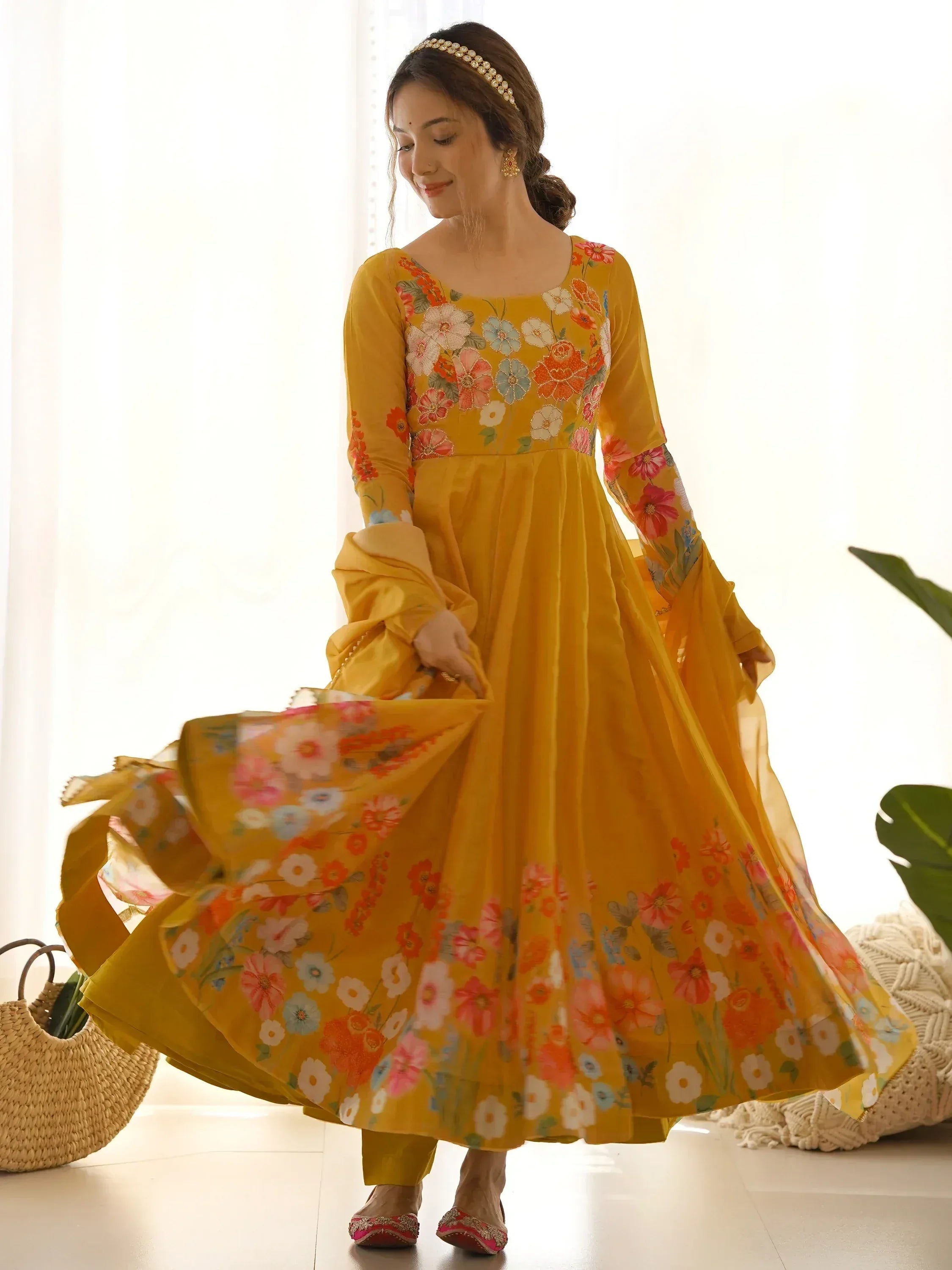 Yellow floral ethnic gown with long sleeves, perfect for Indian occasions and festive wear