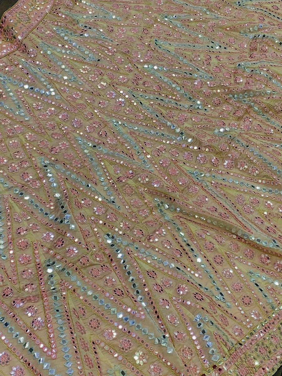 Pink and gold ethnic lehenga fabric with mirror work and floral embroidery