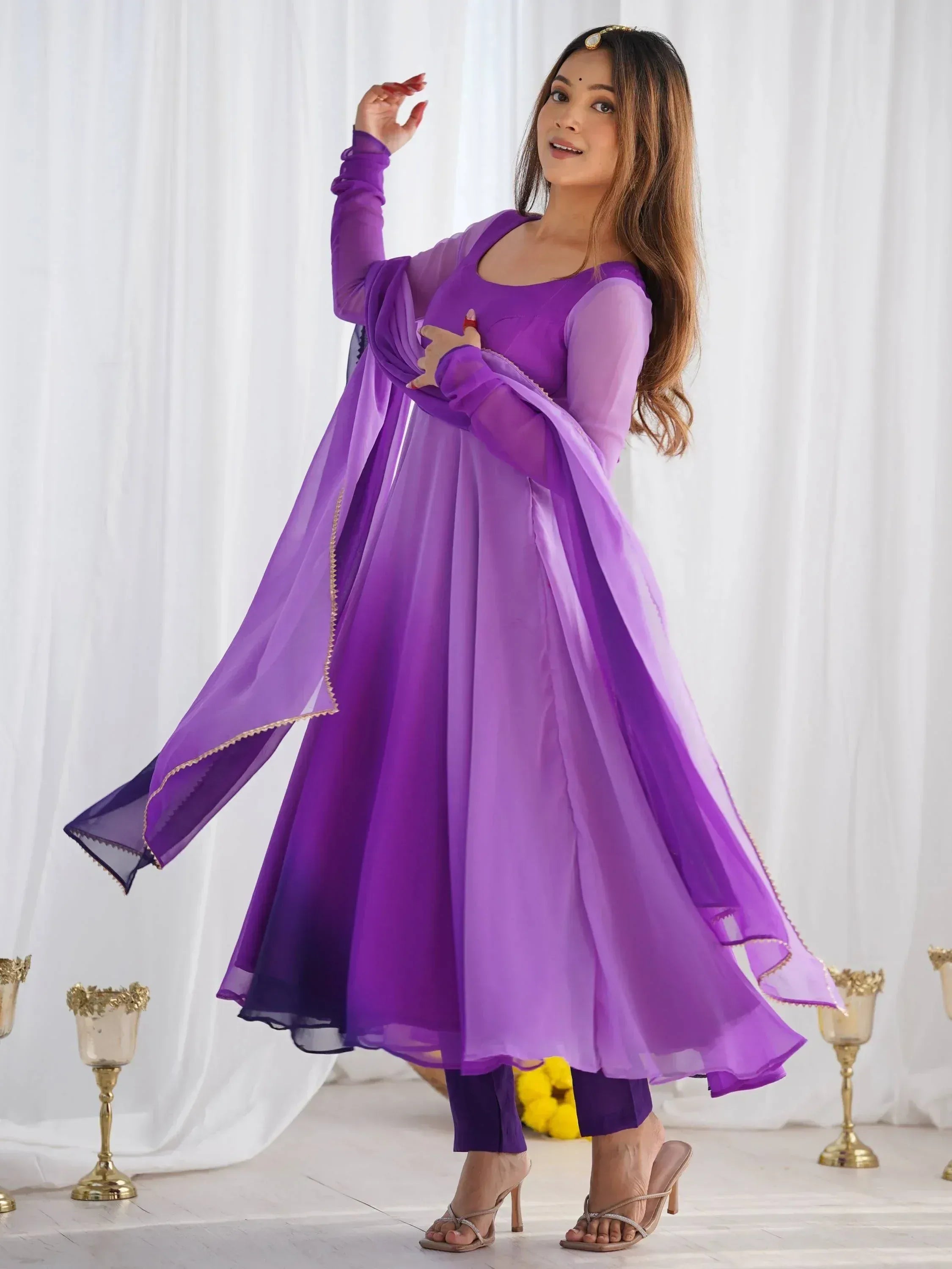 Purple ethnic anarkali suit with sheer overlay, perfect for Indian weddings and festive occasions