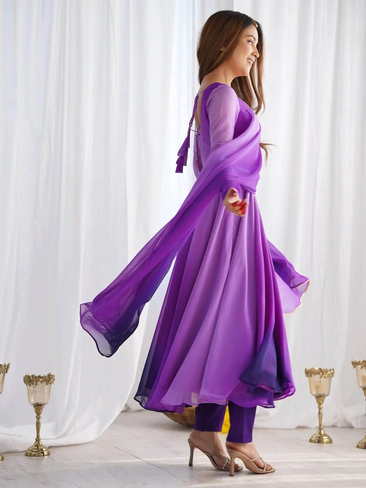 Purple ethnic gown with sheer dupatta, perfect for Indian occasions and festive wear