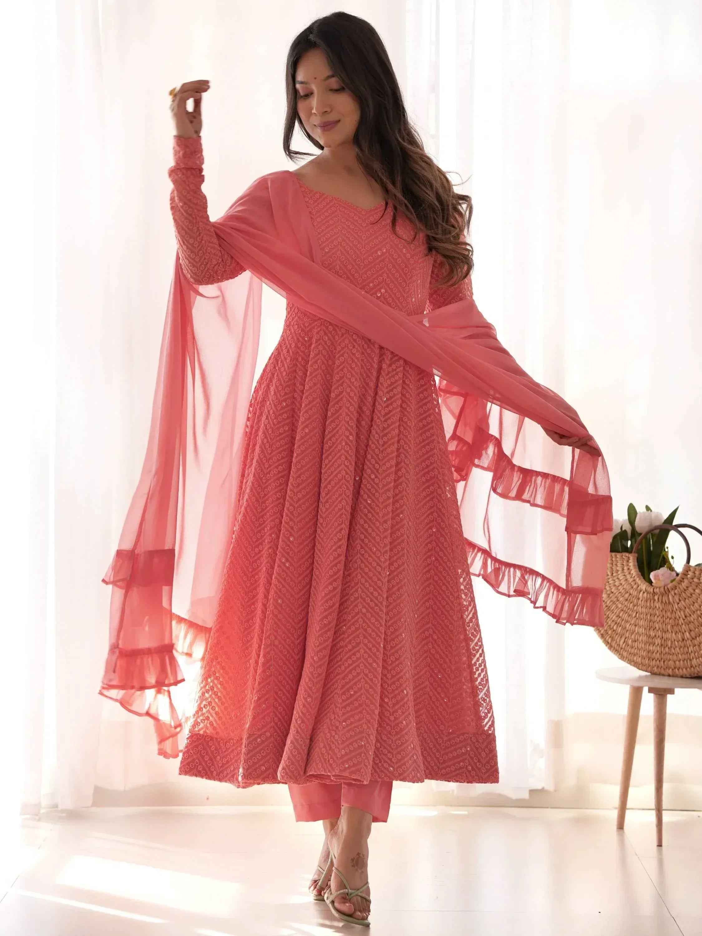 Coral pink embroidered anarkali suit with ruffled dupatta, perfect for Indian ethnic wear occasions