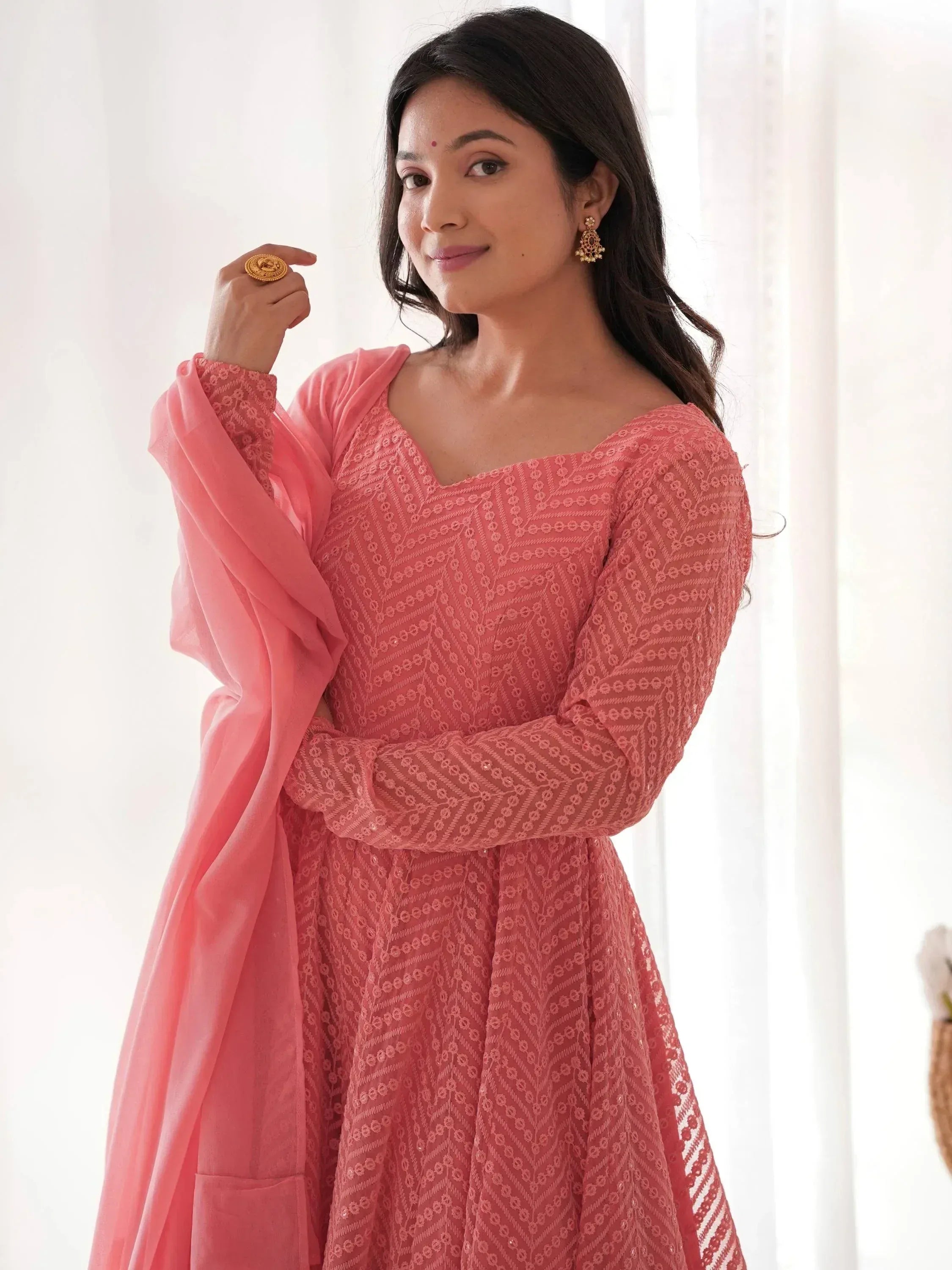 Pink embroidered ethnic anarkali gown with matching dupatta, perfect for Indian occasions and festivals.