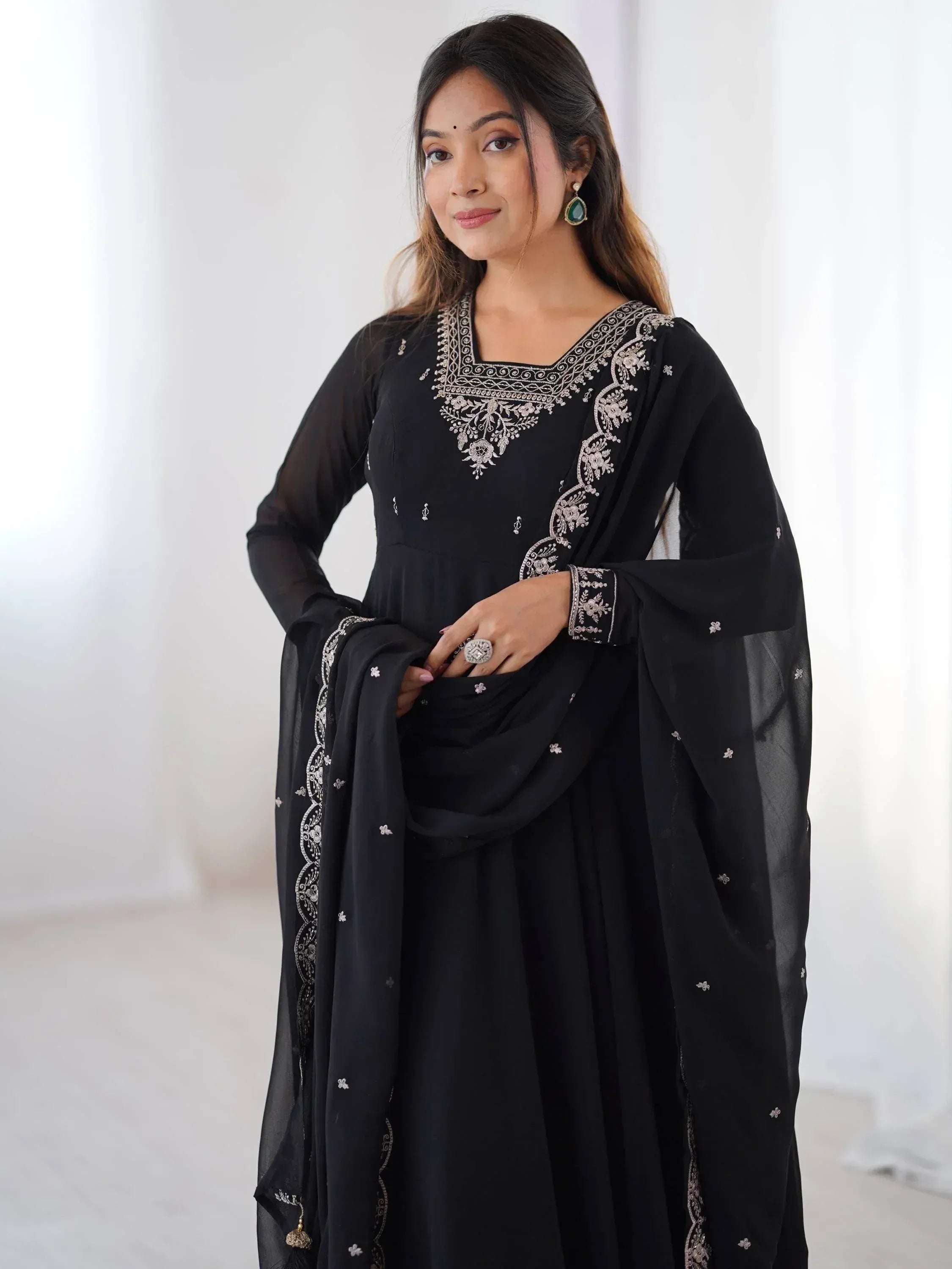 Black embroidered ethnic gown with sheer sleeves and dupatta, perfect for Indian occasions.